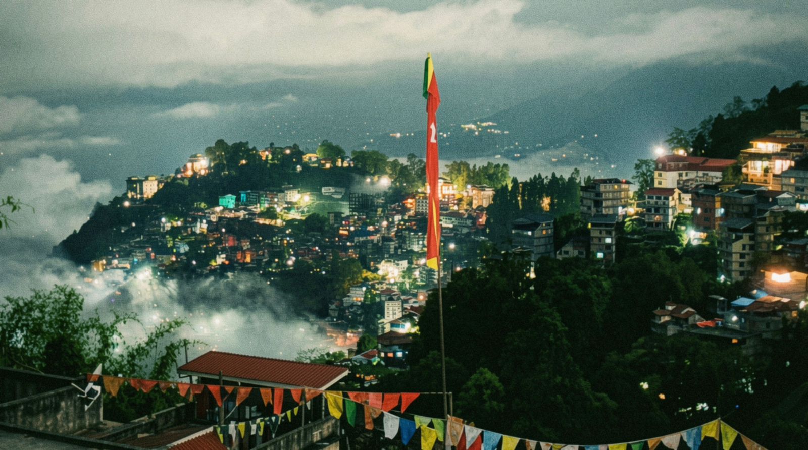 Gangtok night skyline with prayer flags