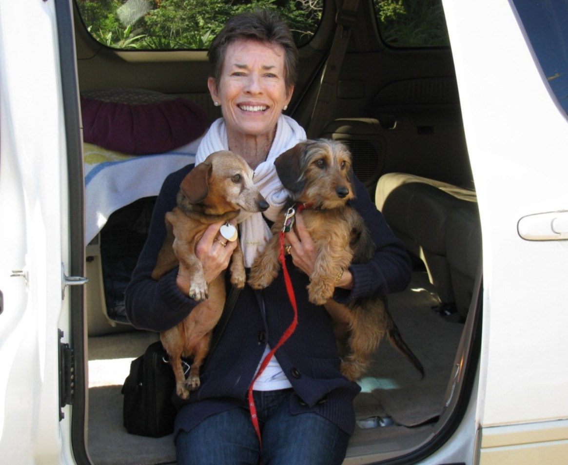 Linda D. Gallagher with her two dogs
