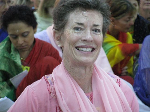 Linda D. Gallagher smiling in pink