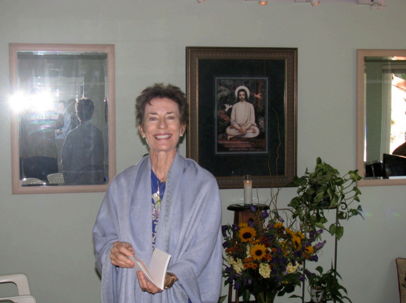 Linda D. Gallagher at home with flowers