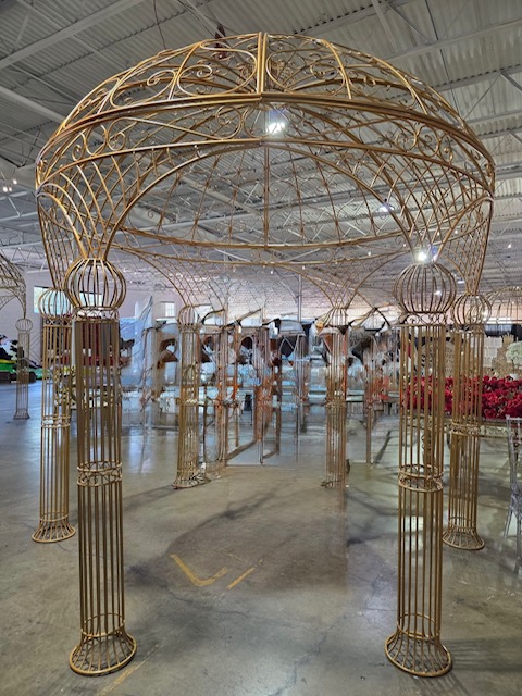 Hem of Grace Events golden gazebo structure wedding coordination Florida