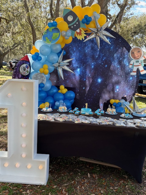 Hem of Grace Events space themed birthday party Florida event design