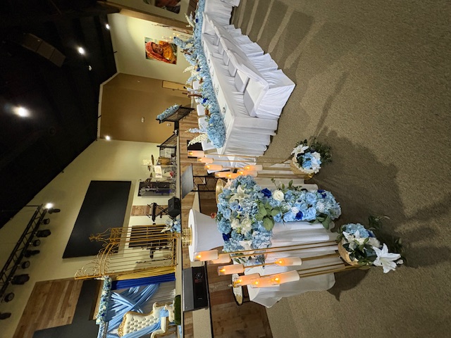 Hem of Grace Events Florida celebration candles blue florals luxury event