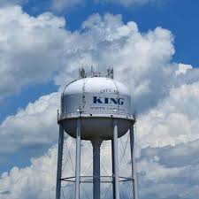 King, North Carolina water tower against open sky