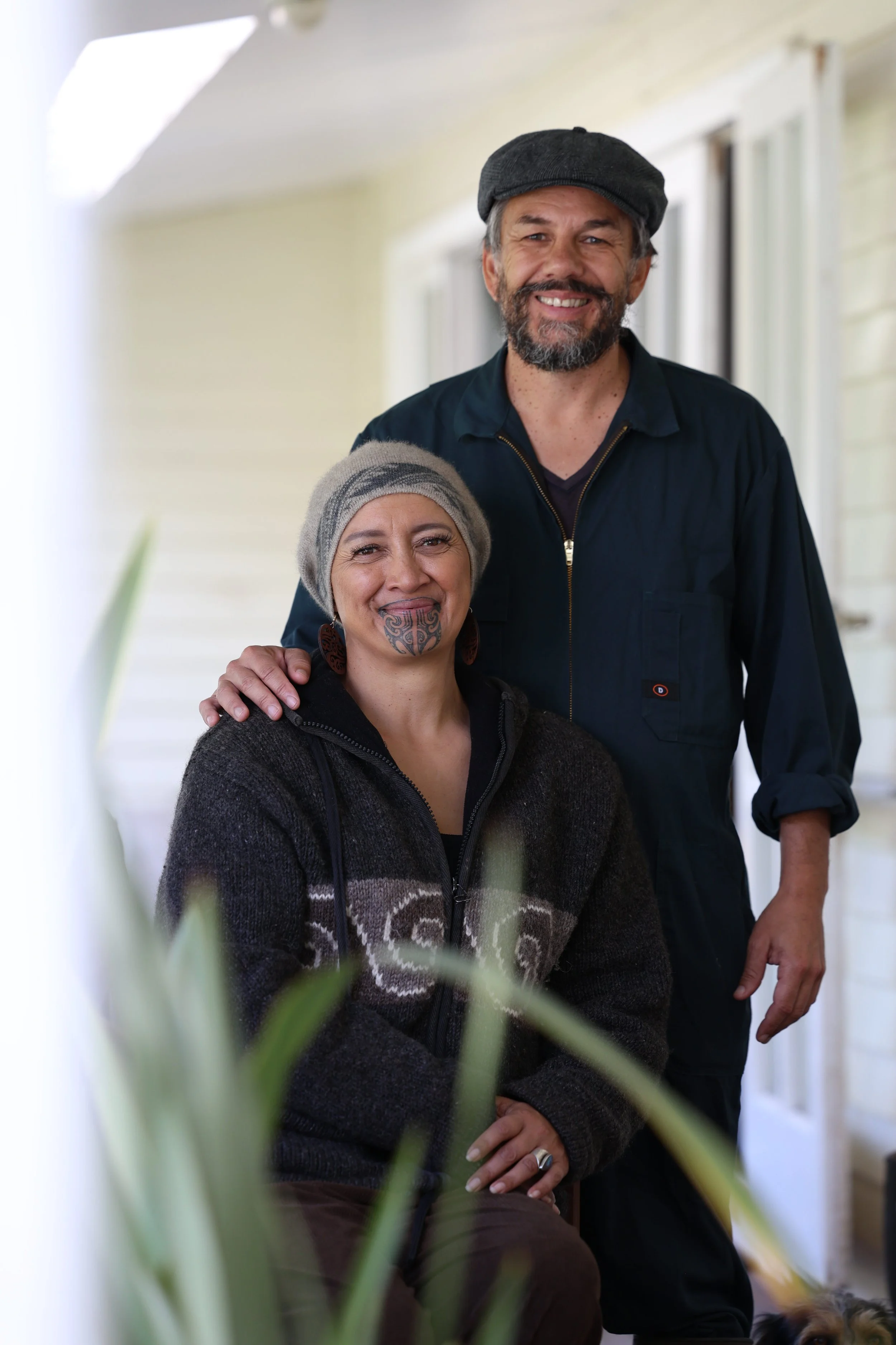 Quinton and Makareta on the porch of their home in Ngāpuhi