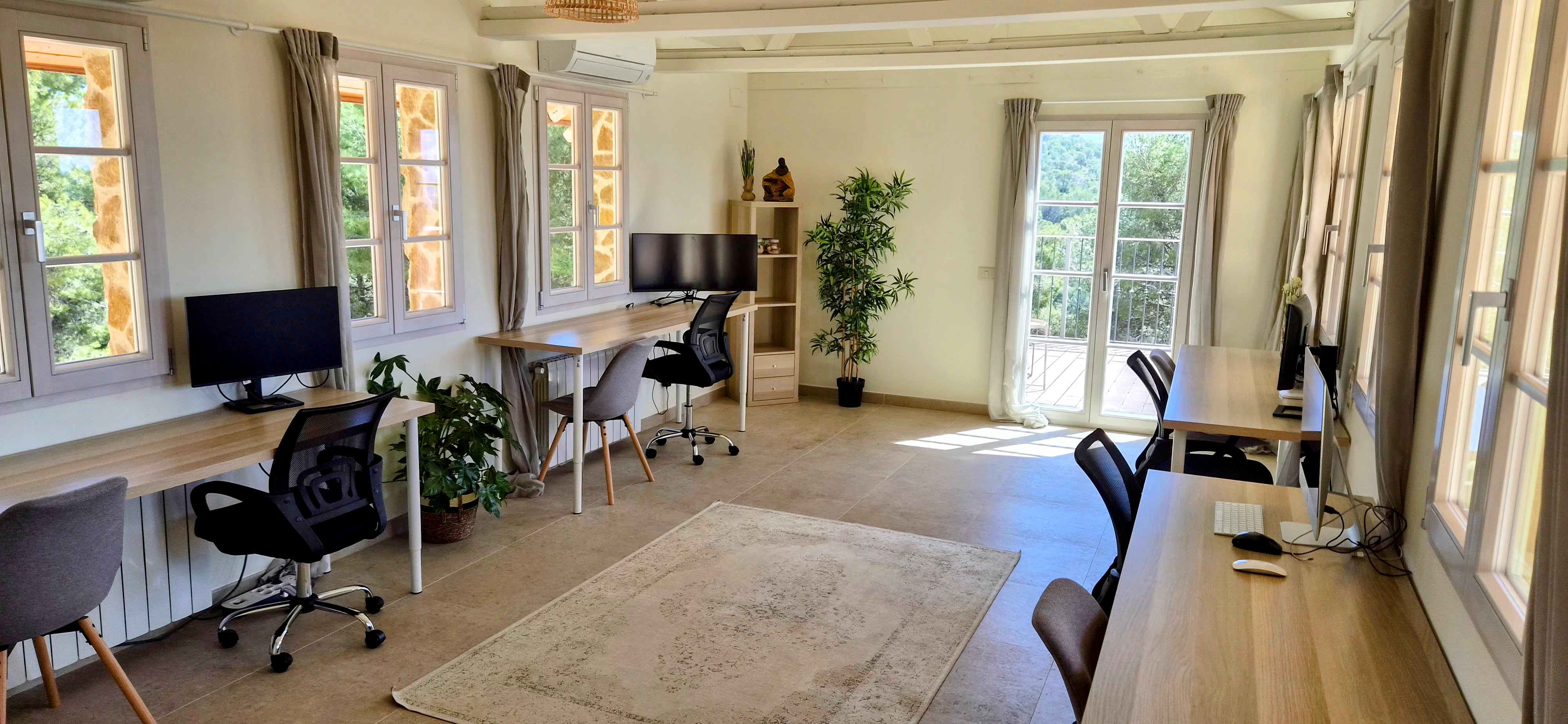 Coworking studio with mountain-facing desks
