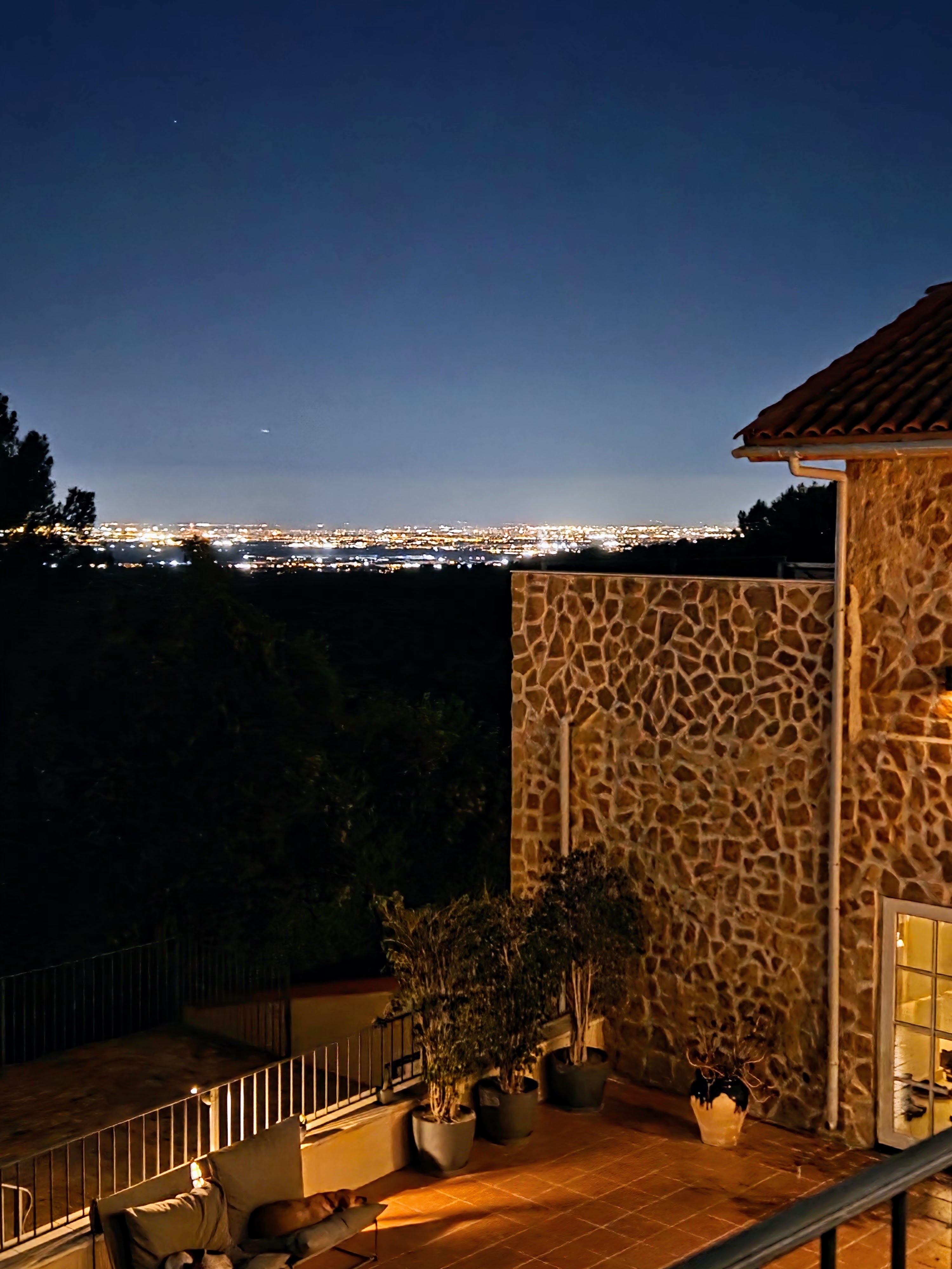 Night terrace at Savi Coliving overlooking Valencia