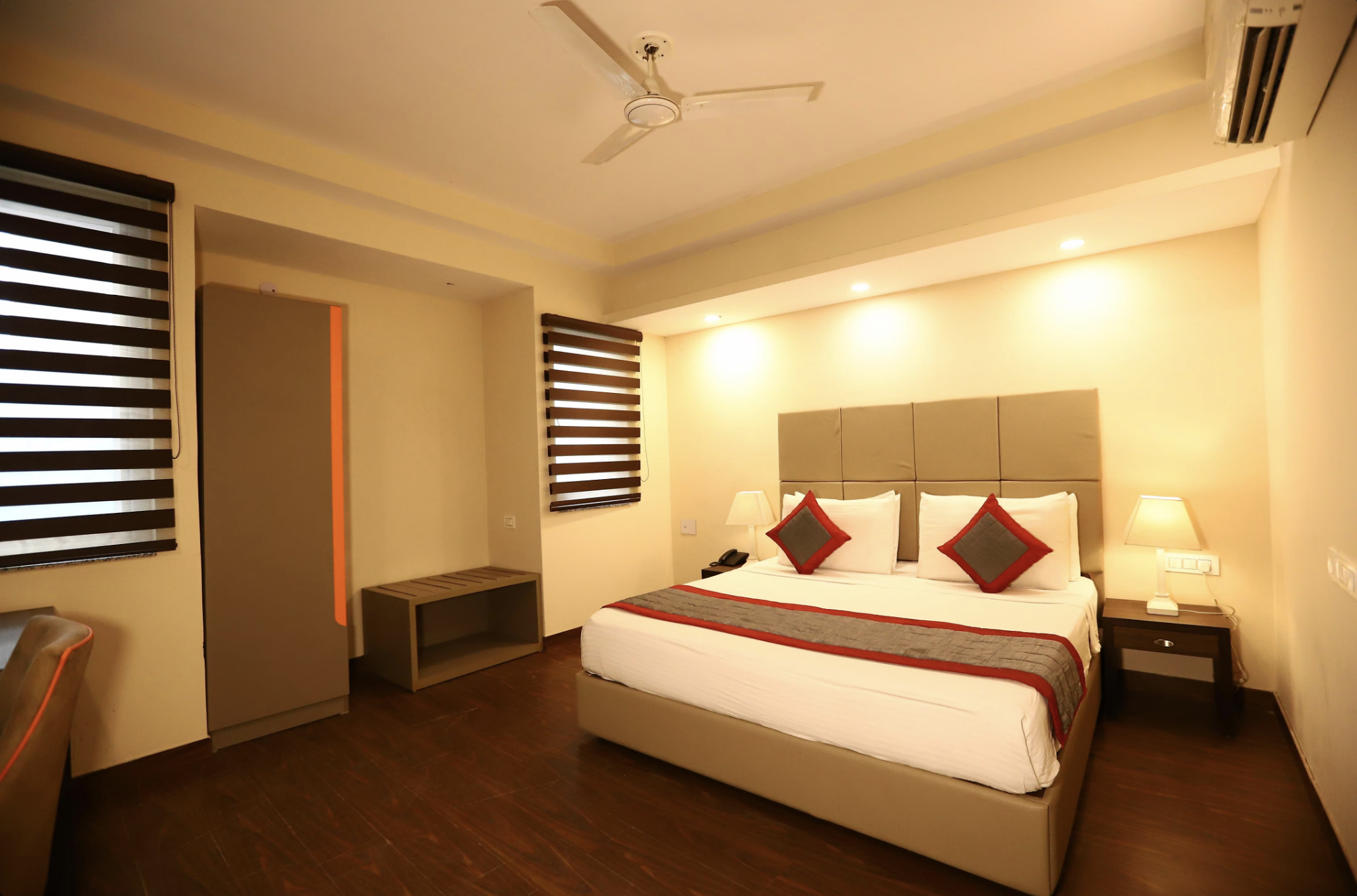Premium Room at Hotel Azulo Inn — king bed, warm lighting