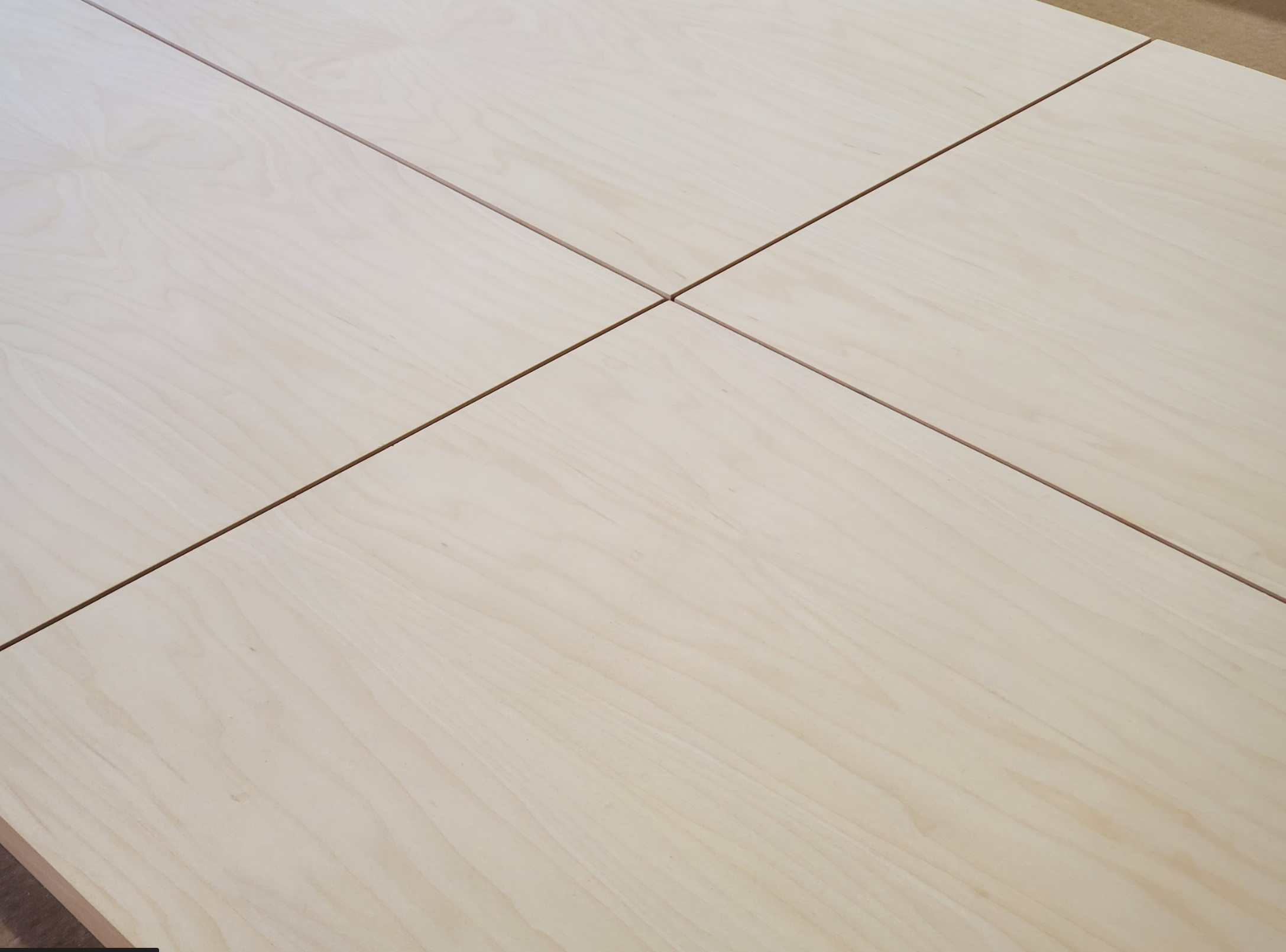 Grain-matched maple Premium Veneer flat-panel doors and drawer fronts