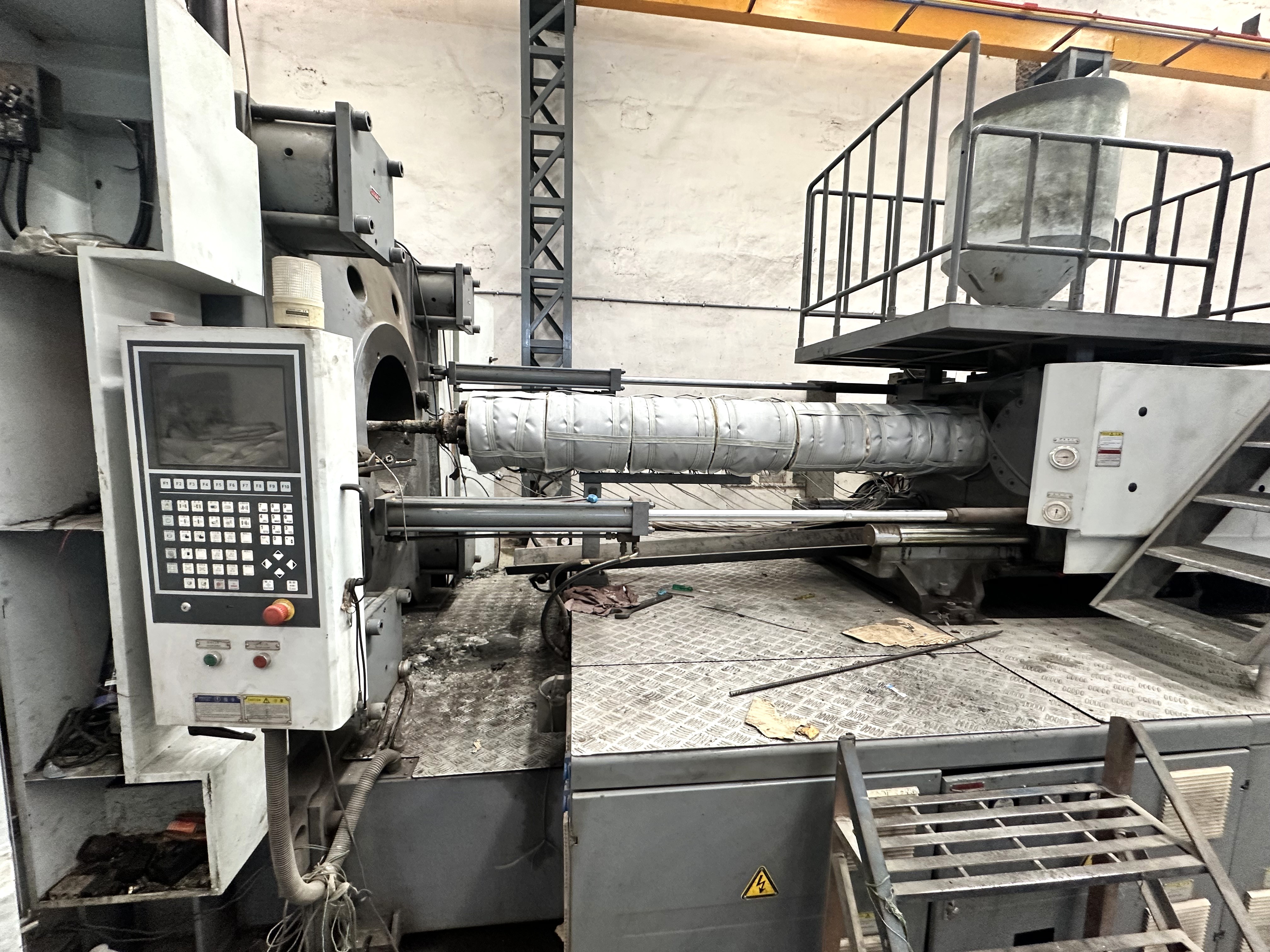 i-Wrap insulation jacket installed on injection molding machine barrel at customer plant