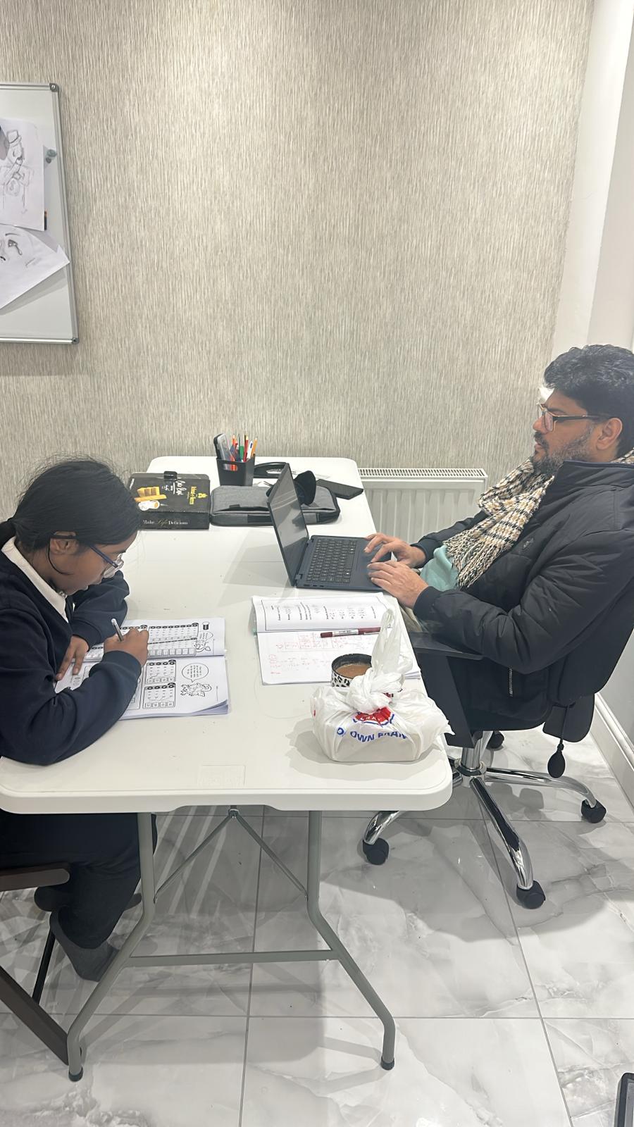 Boys studying together