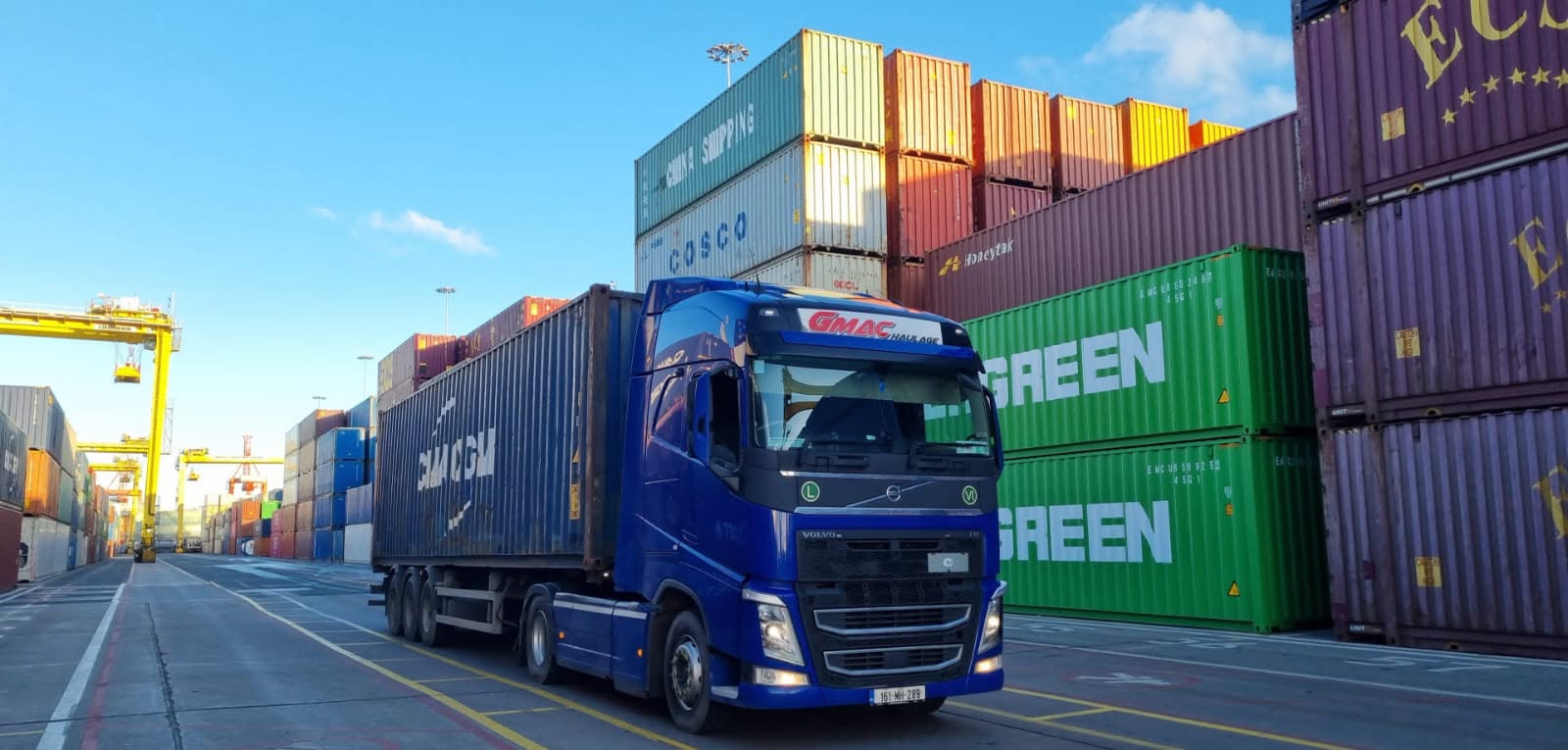 GMAC Haulage truck at container port handling shipping containers