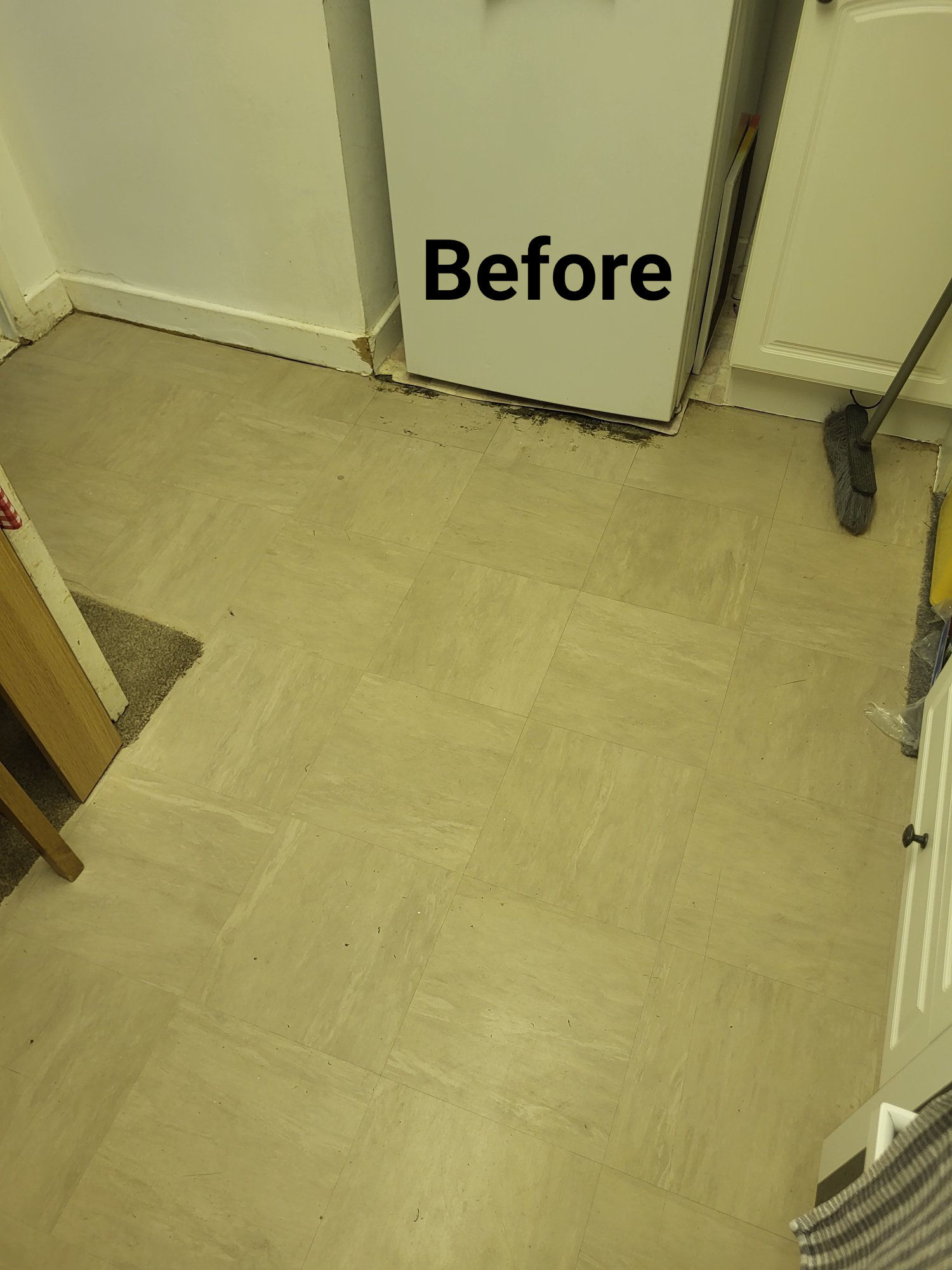 Worn old floor tiles before replacement