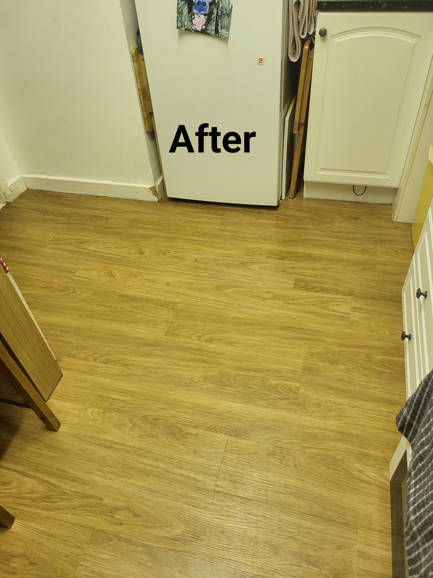 New warm oak laminate floor installed in the same room