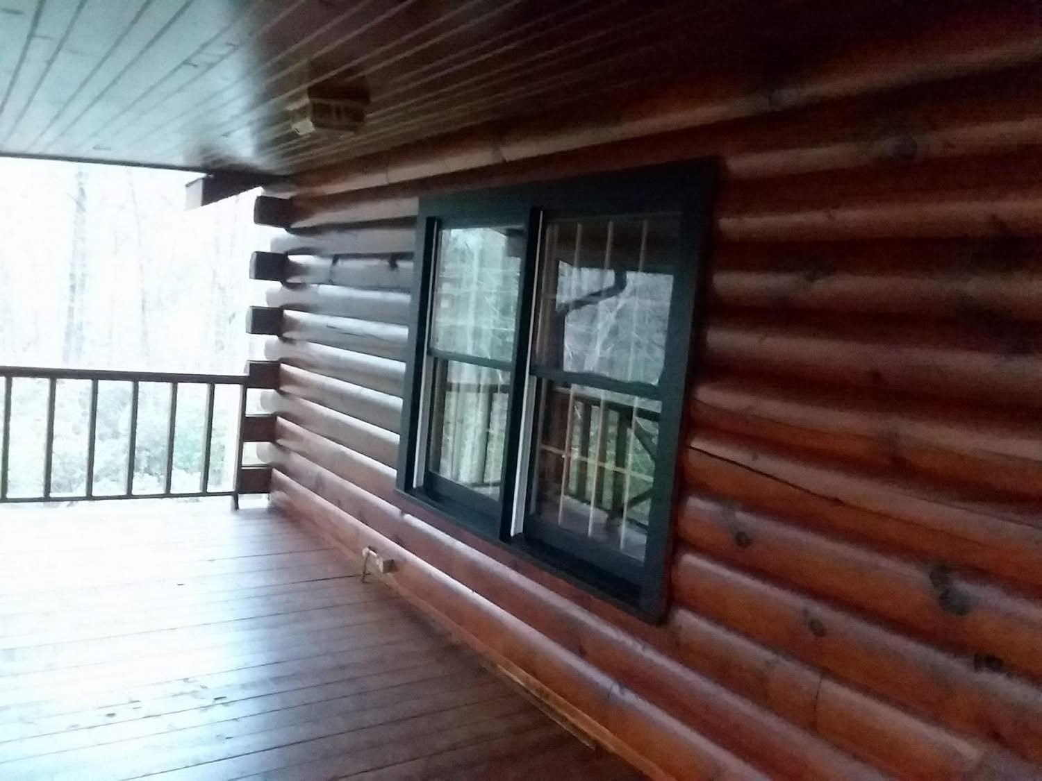 Journey's Handyman project — Stained porch, ceiling and window trim detail