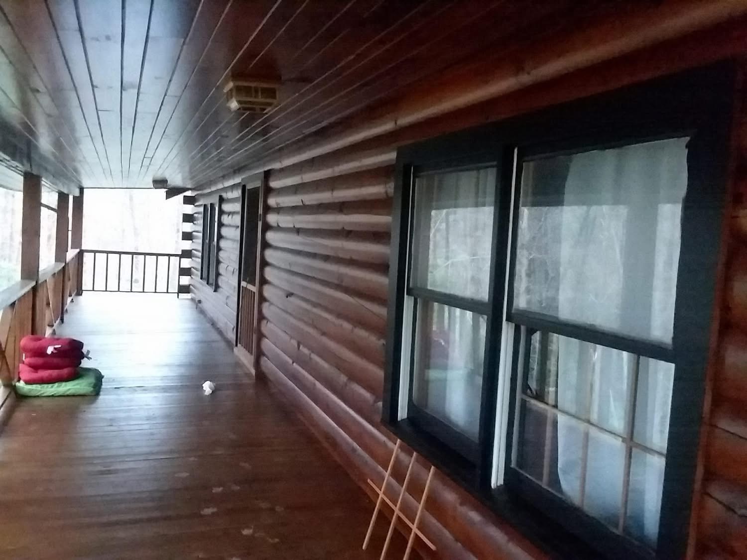 Journey's Handyman project — Wraparound porch staining and finish work