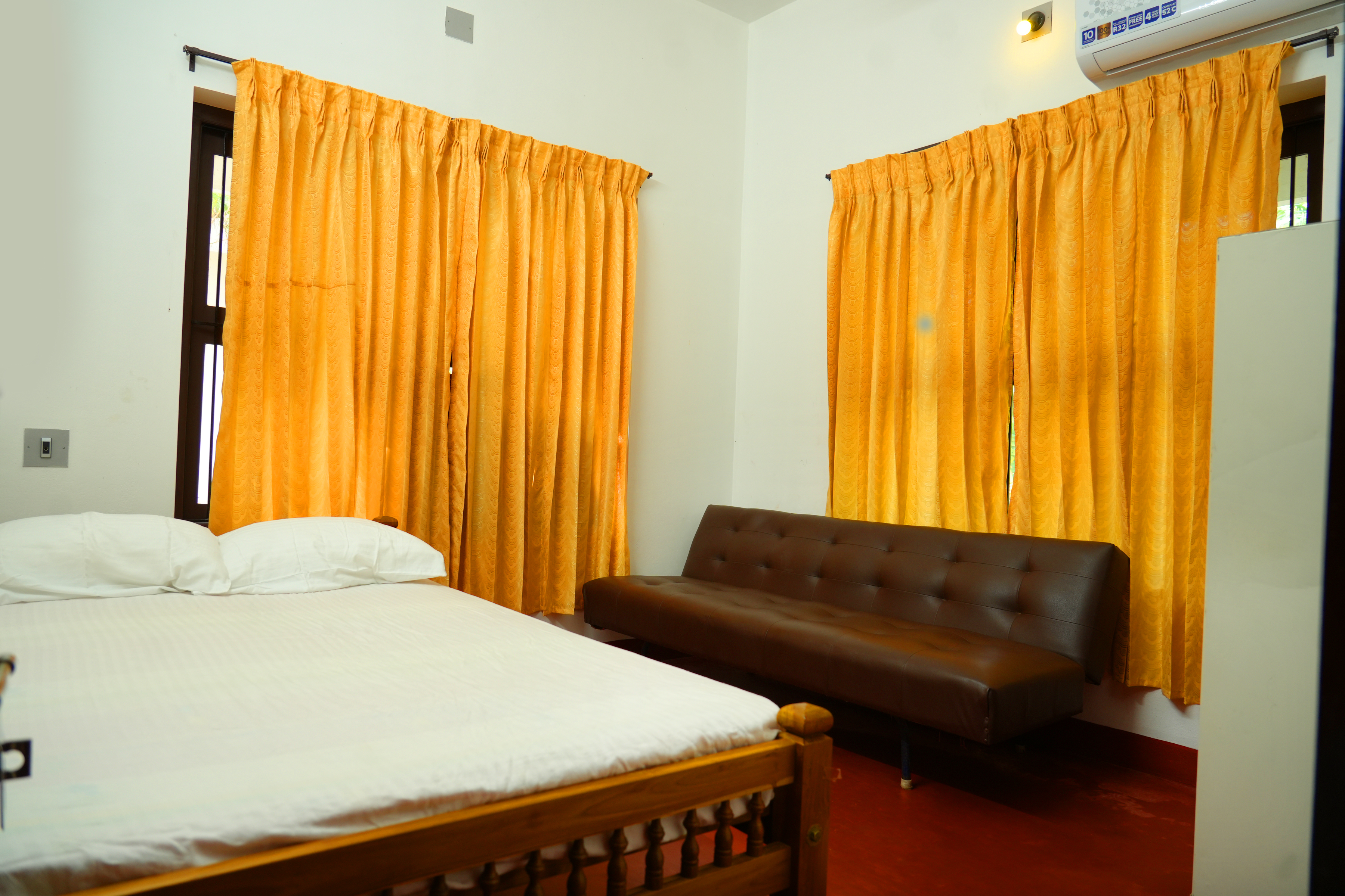 The bedroom at Kakkanat Ayurvedic postnatal care villas, Kerala