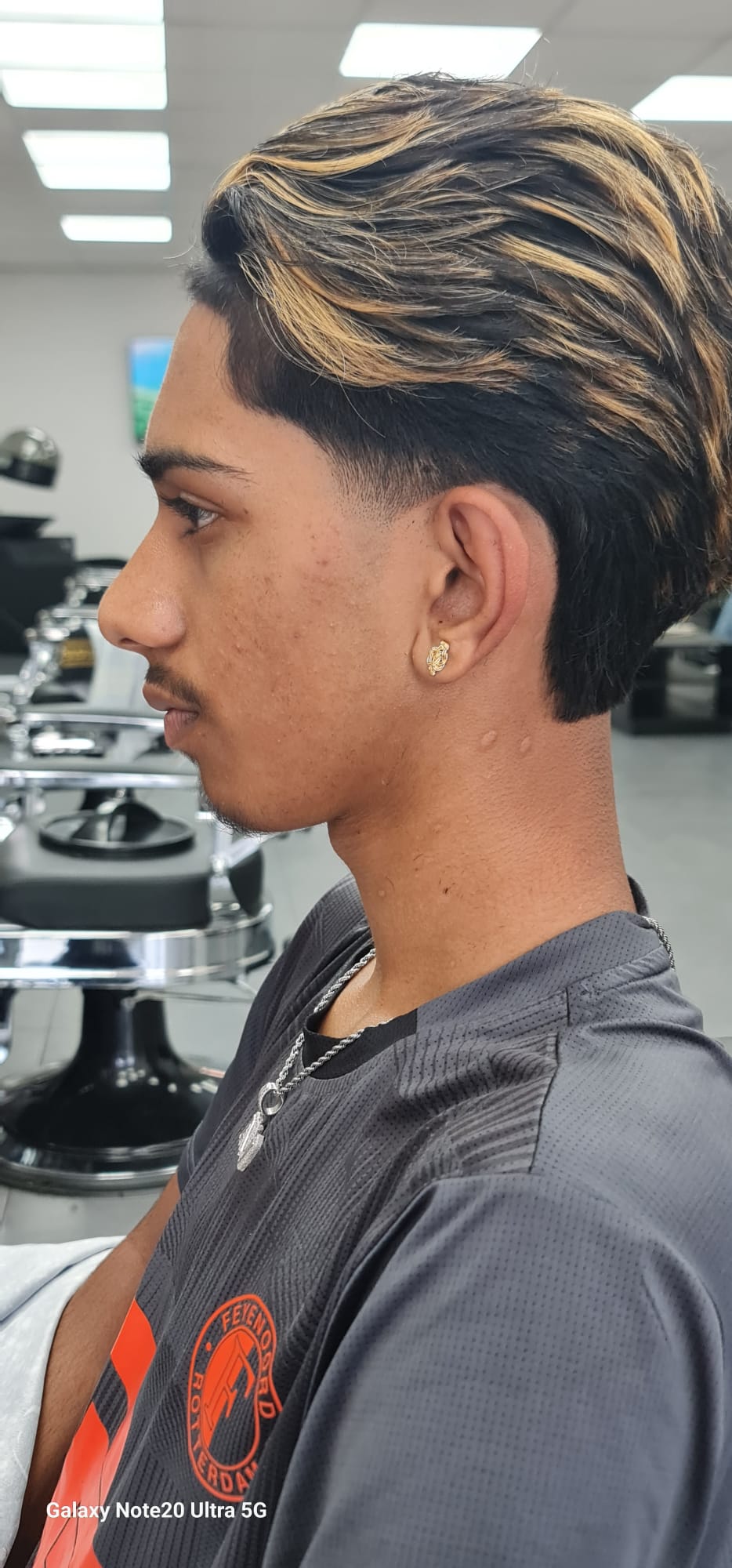 Textured curly fade haircut