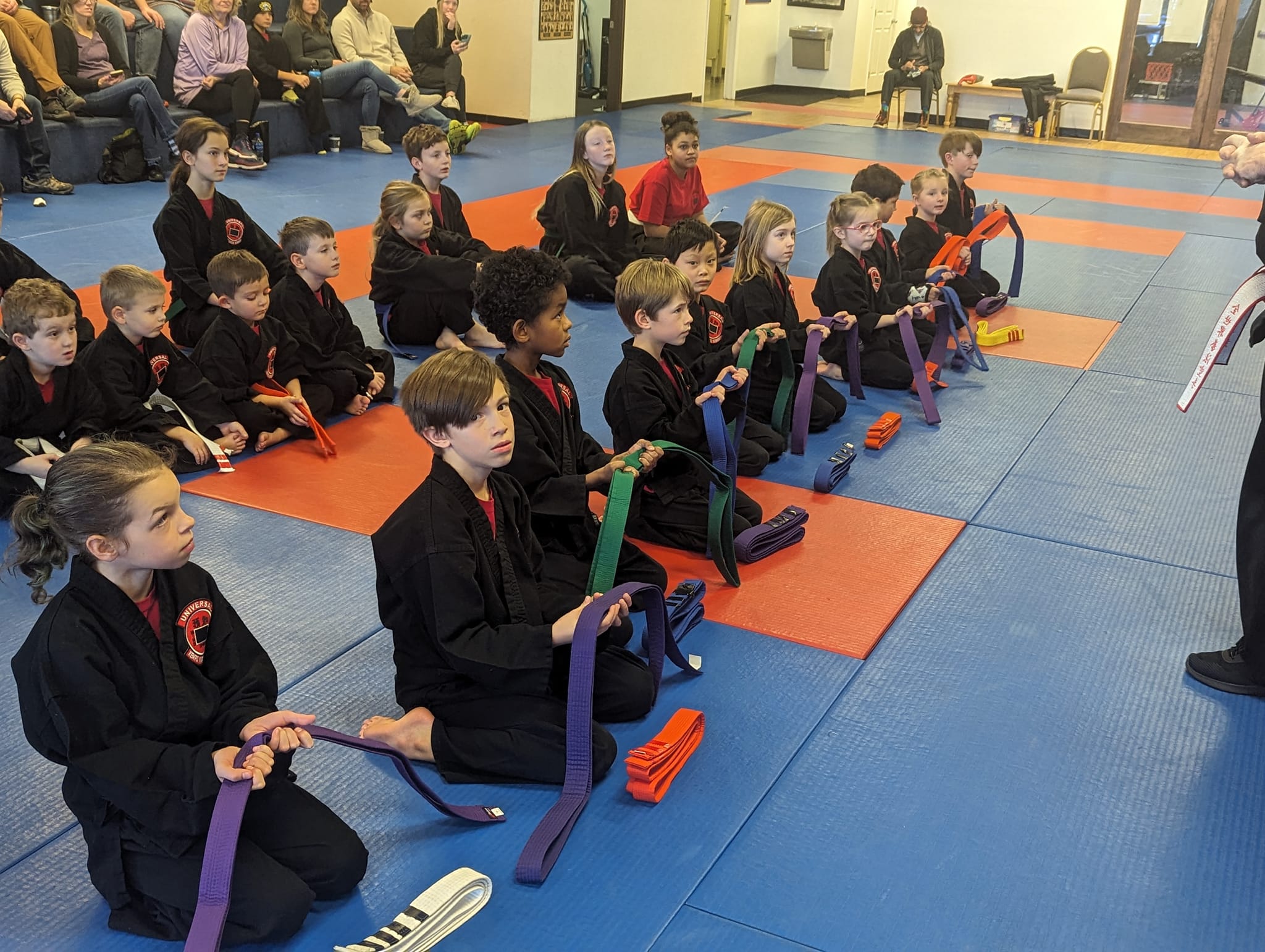 Belt ceremony — earned, not given