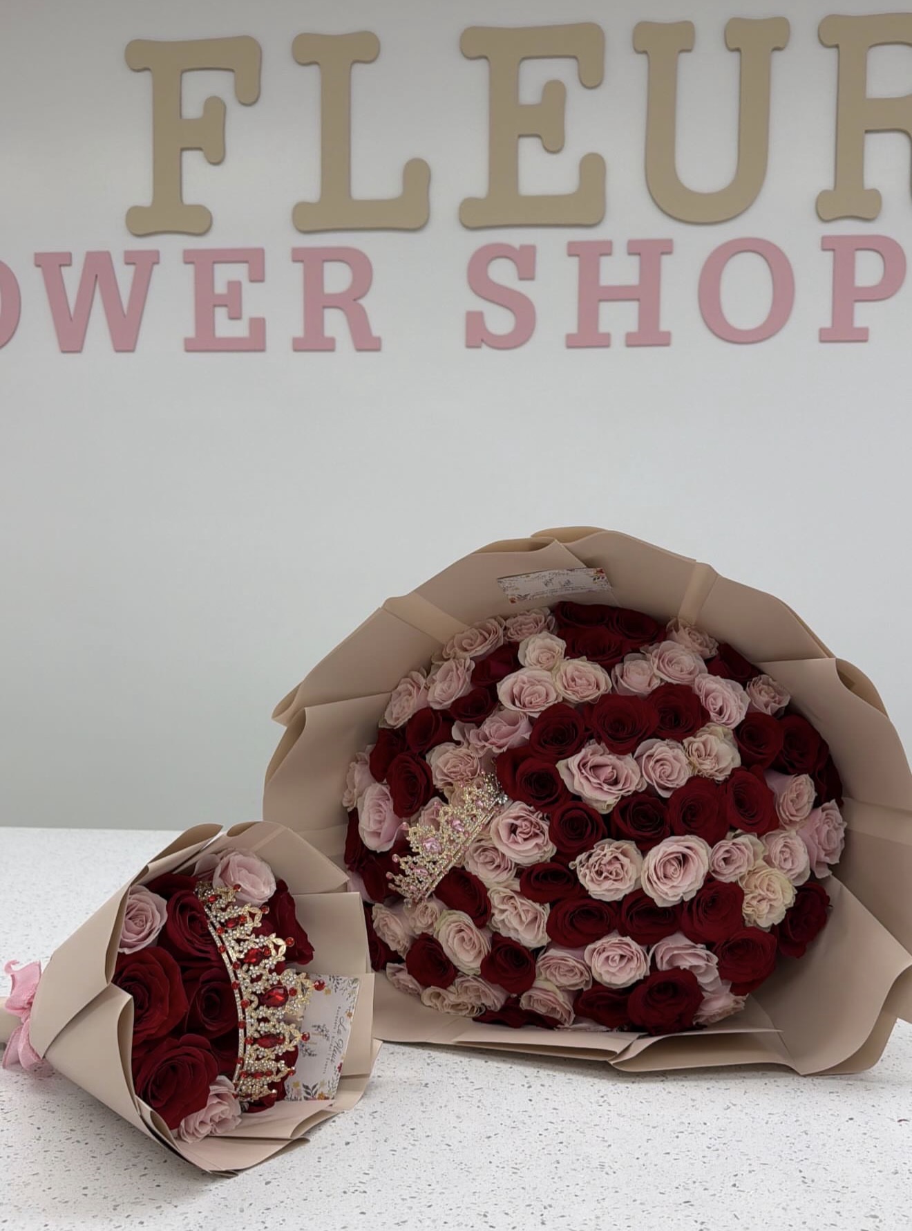 Burgundy and pink rose crown bouquet at La Fleur Flower Shop