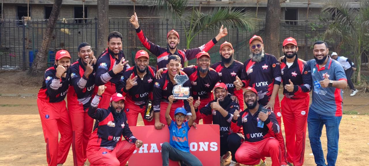UNIX cricket team celebrating with trophy in custom red-and-black jerseys