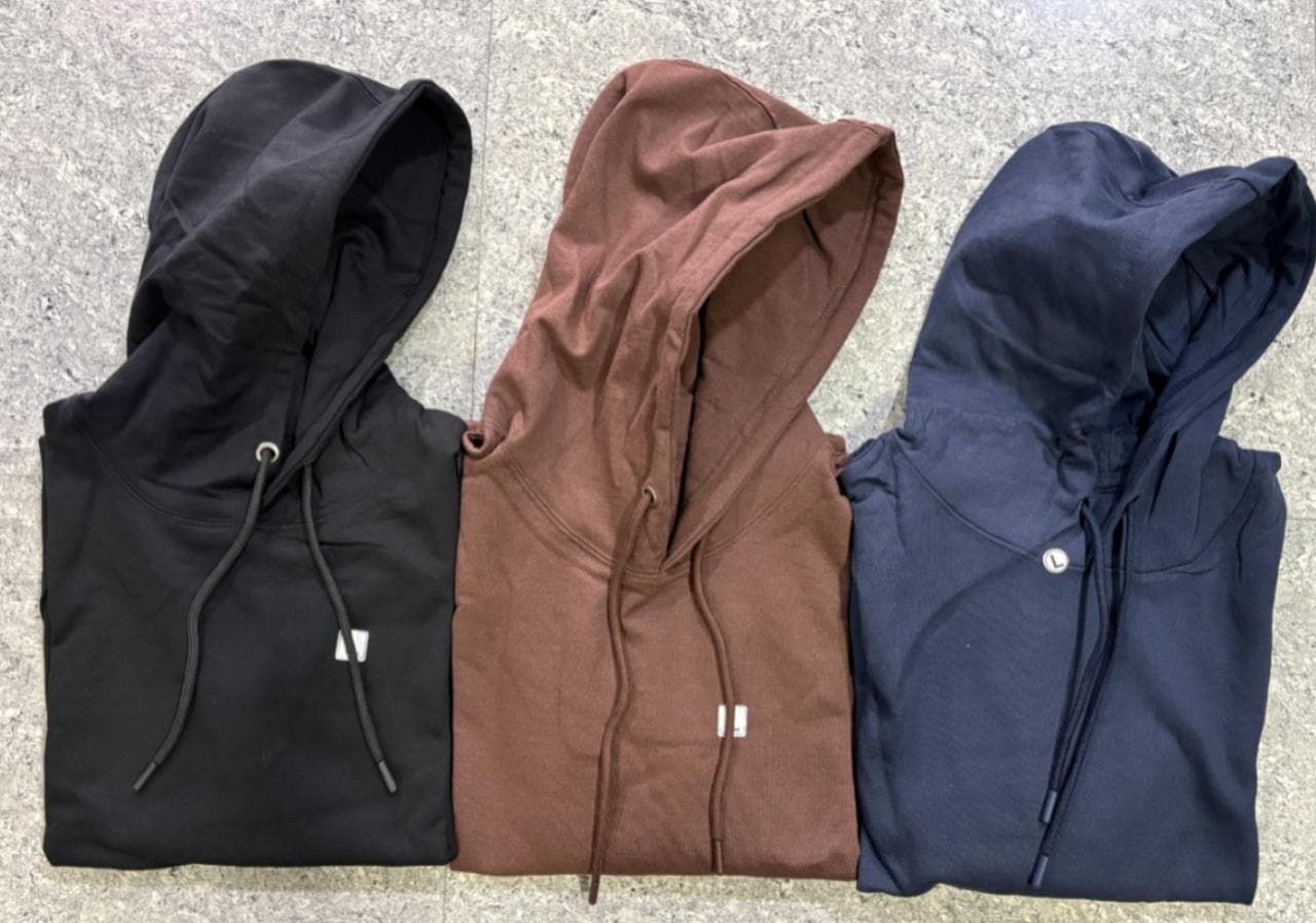 Cotton fleece hoodies in black, cocoa brown and navy