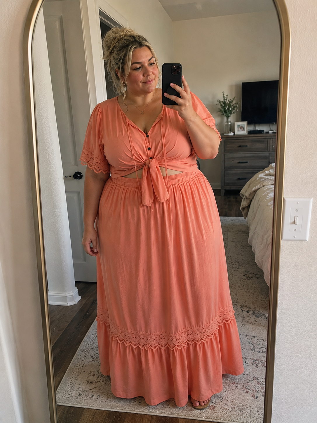 Customer wearing a coral maxi set with lace trim