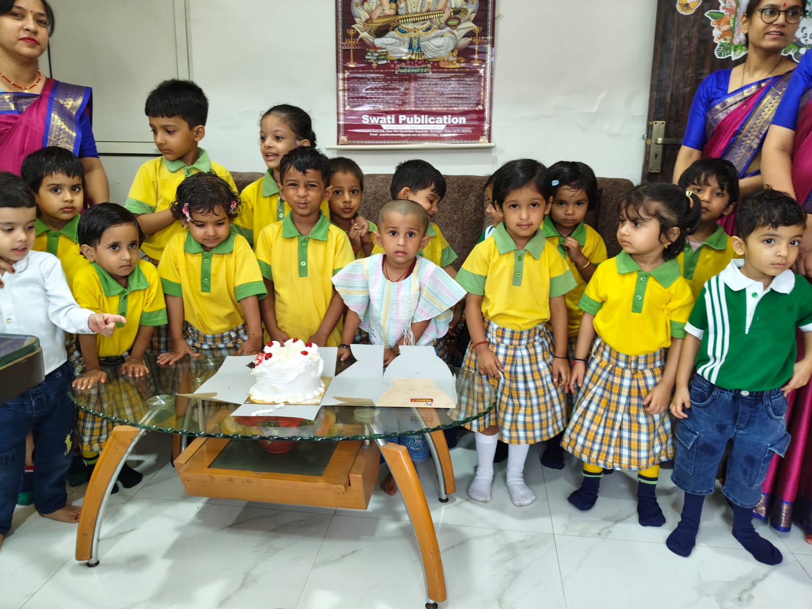 Birthday celebration with students and cake