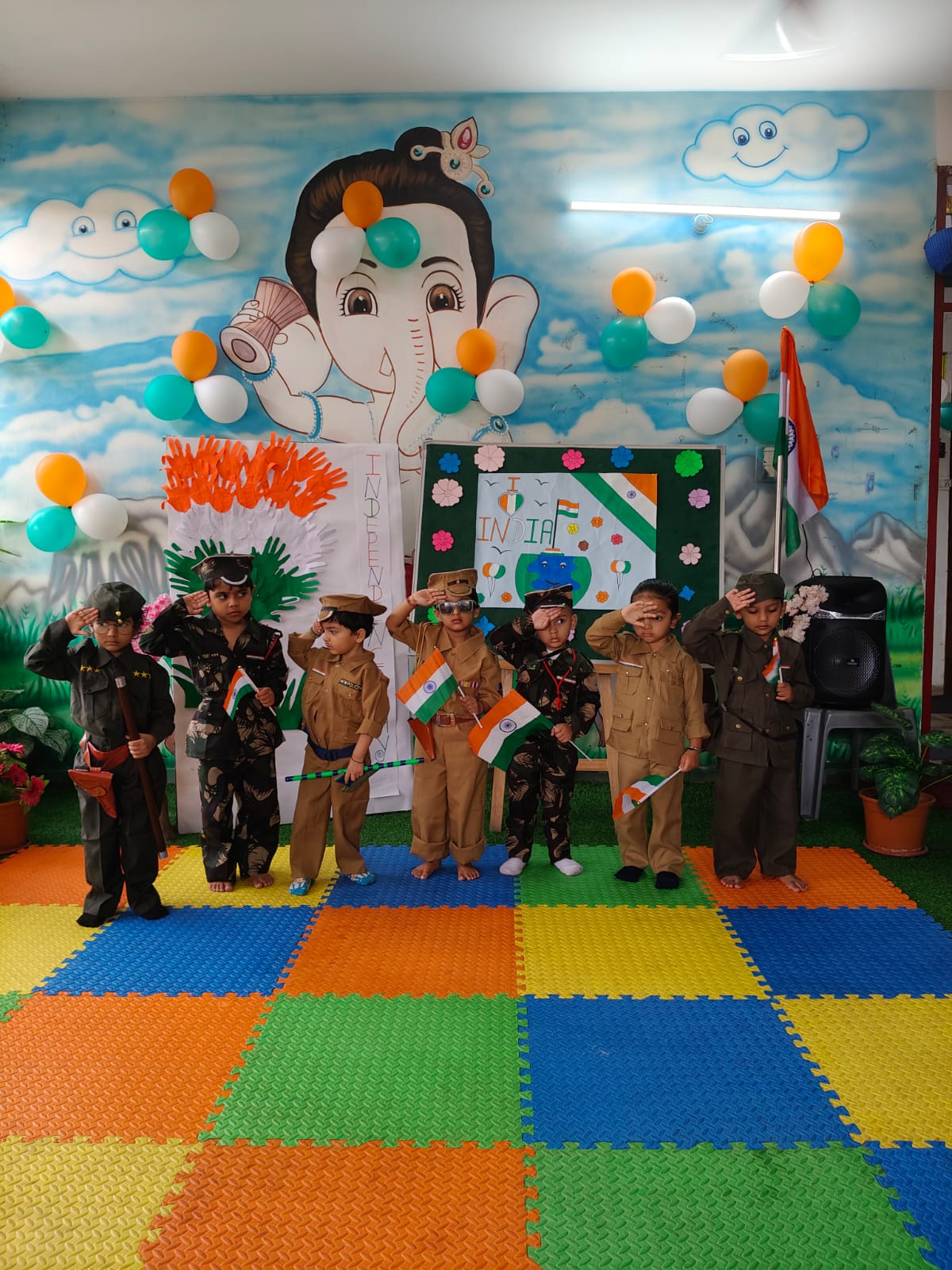 Independence Day celebration with children in army uniforms