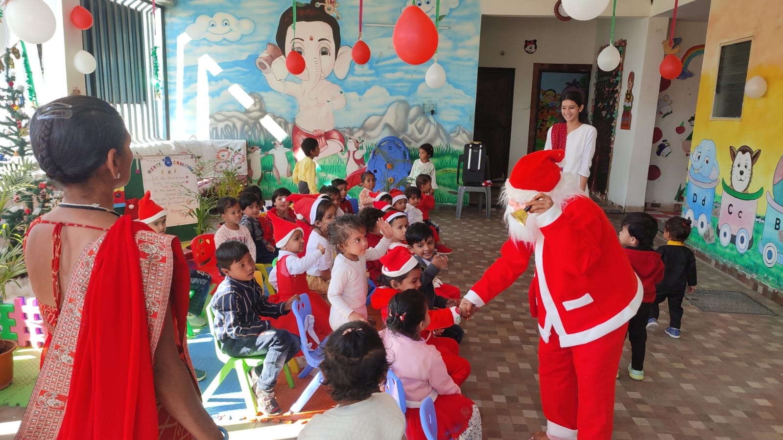 Santa Claus with children Christmas celebration