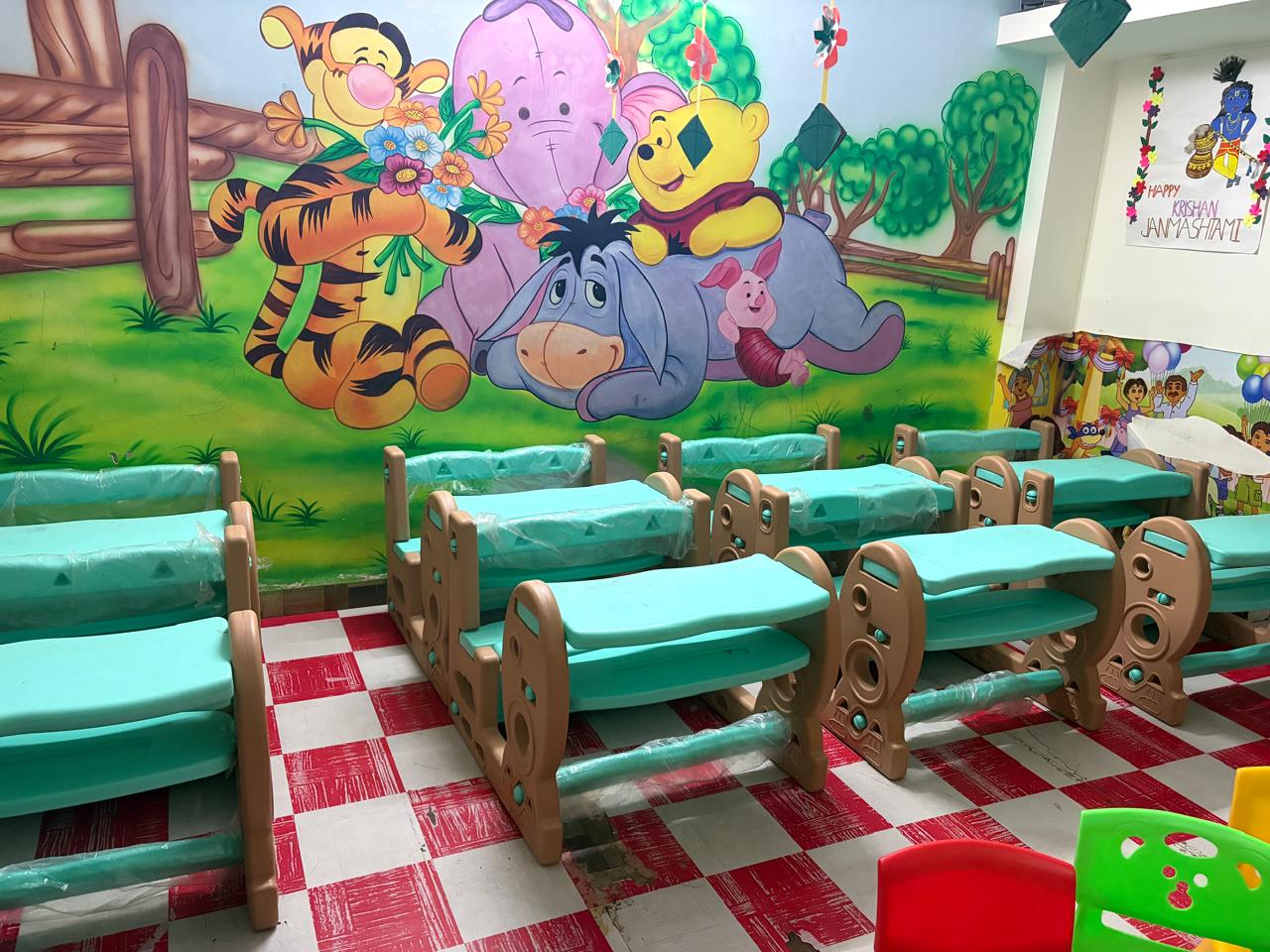Colorful classroom with Winnie the Pooh mural