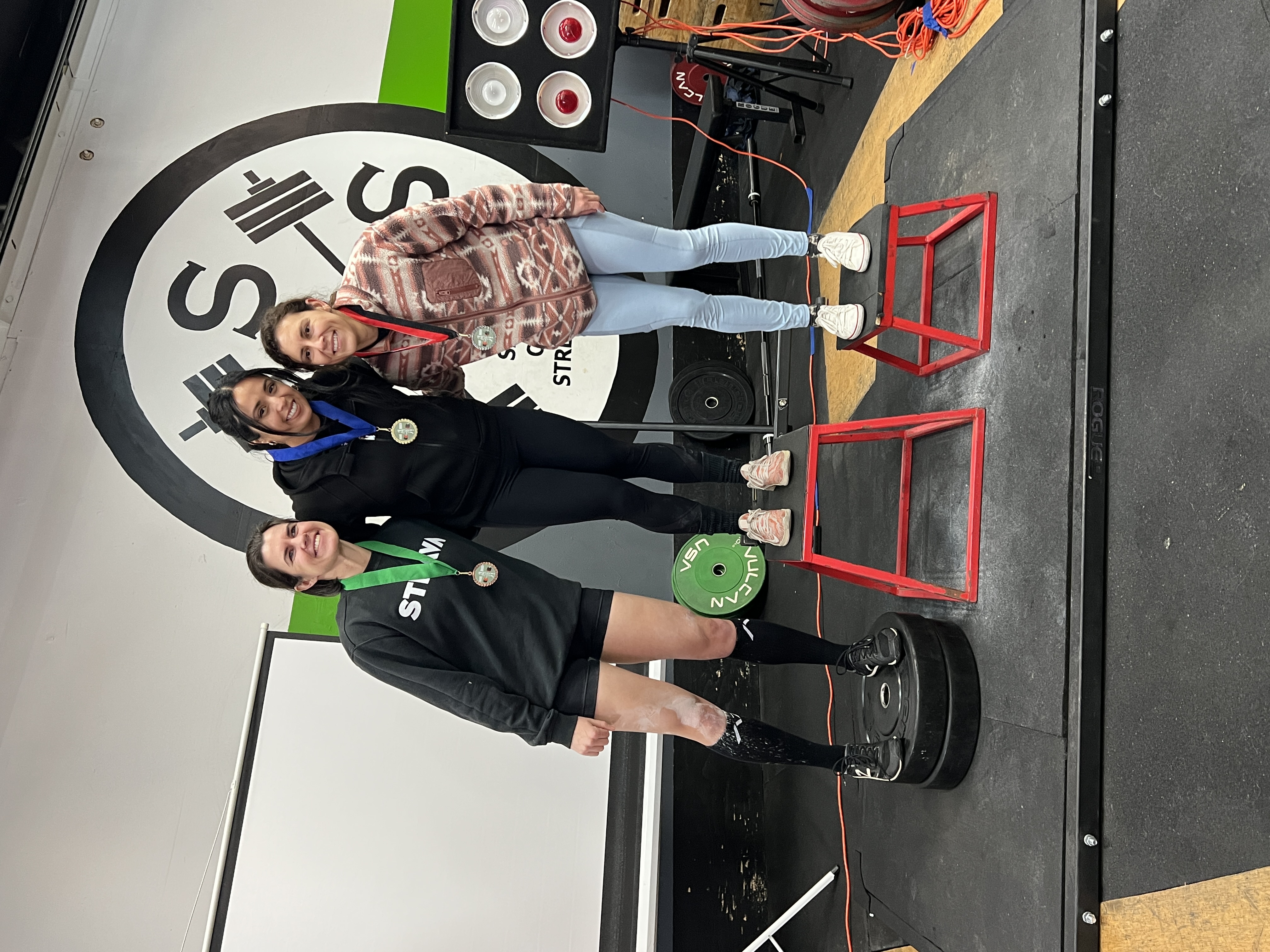 Santa Cruz Strength competition podium — members with medals