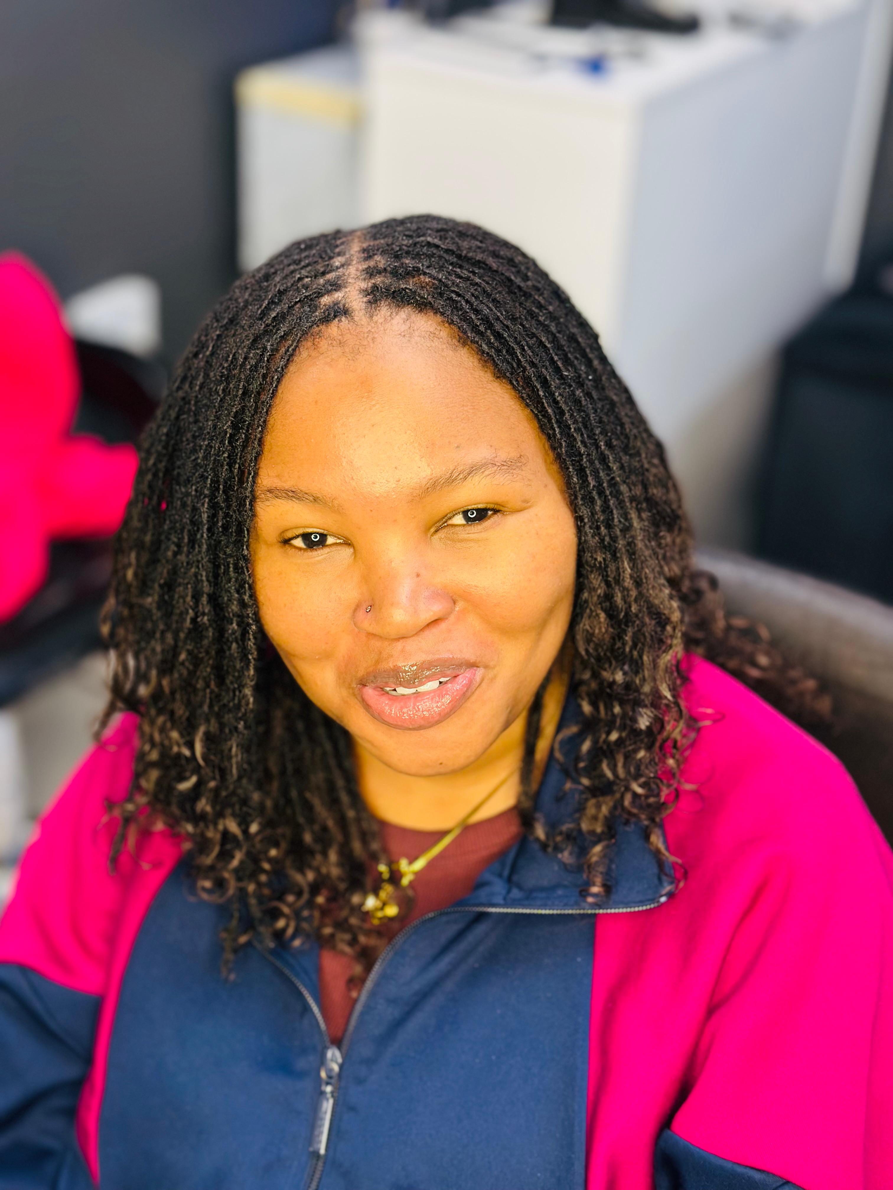 Beautiful curly loc ends styling