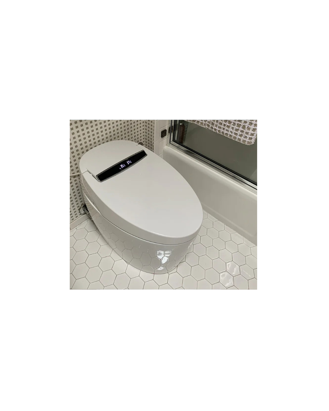 FlowLux smart toilet — hex-tile bathroom