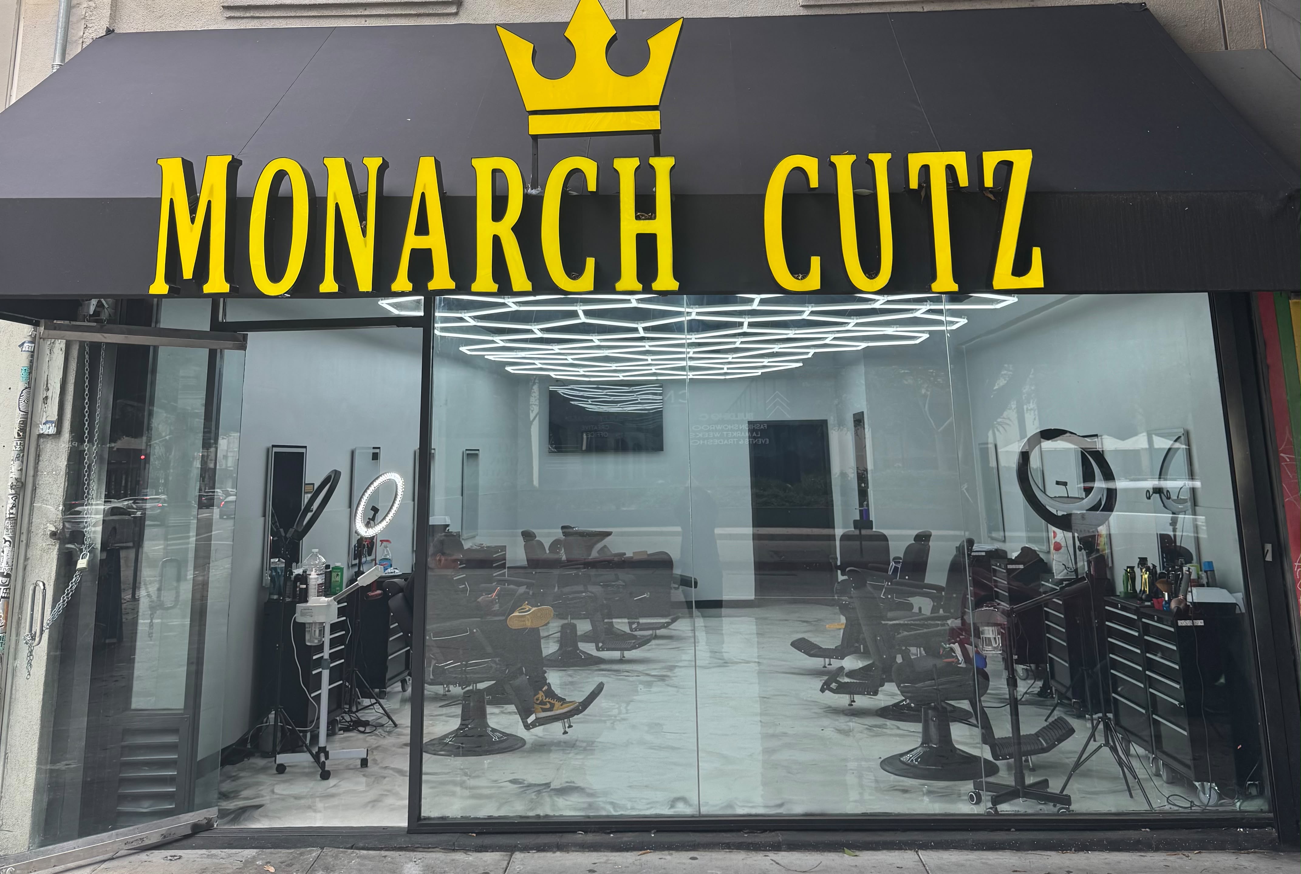 Monarch Cutz interior — hex LED ceiling