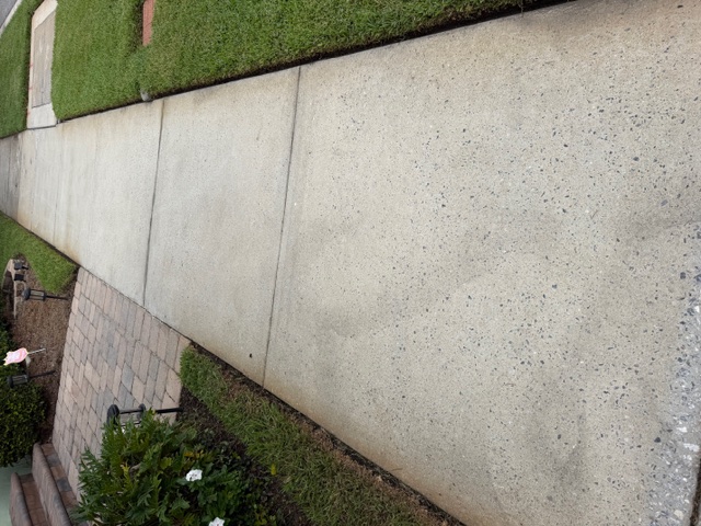 Residential sidewalk pressure washing before and after cleaning in Lake Nona