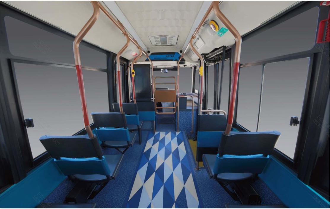 Nuora cabin aisle view with copper rails and blue patterned floor