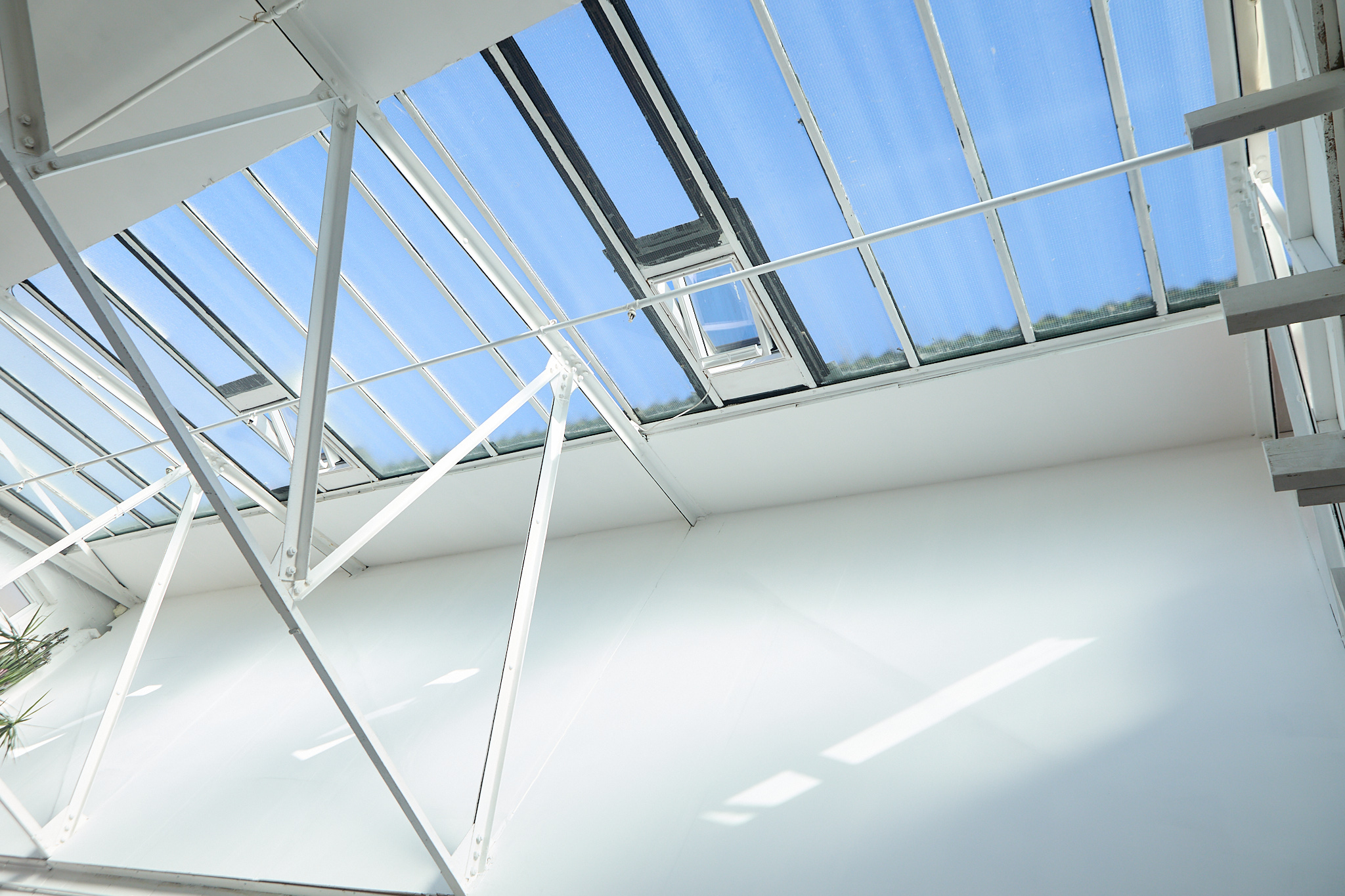 Sawtooth roof skylights flooding the studio with diffused daylight, Hackney Wick