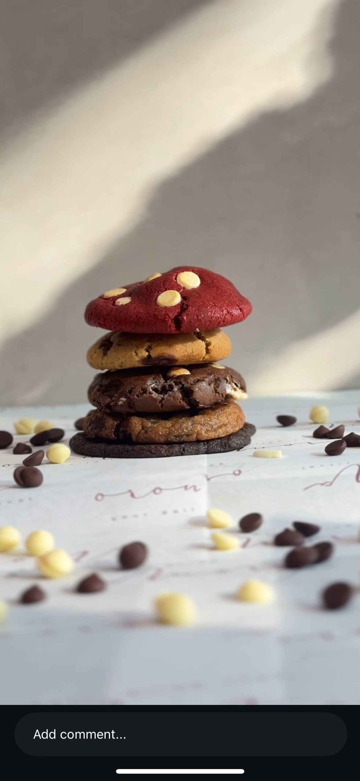 Stack of OROMA-branded cookies