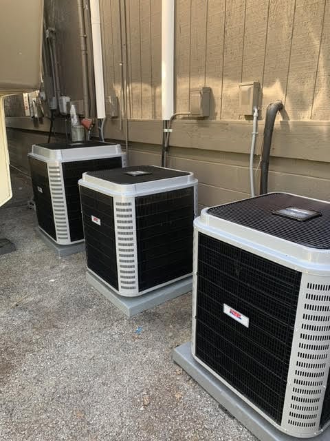 Palmer HVAC air conditioning installation — outdoor AC condenser units installed by Palmer HVAC technicians in Northwest Arkansas