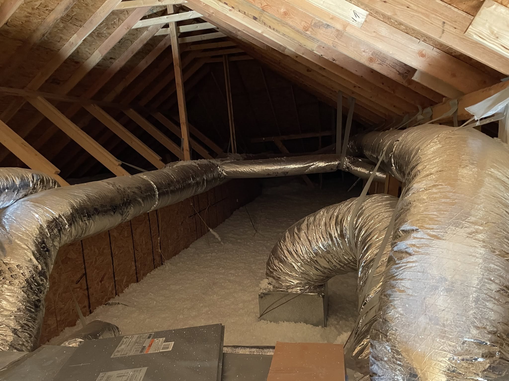 Palmer HVAC residential attic ductwork — heating and cooling team in Northwest Arkansas