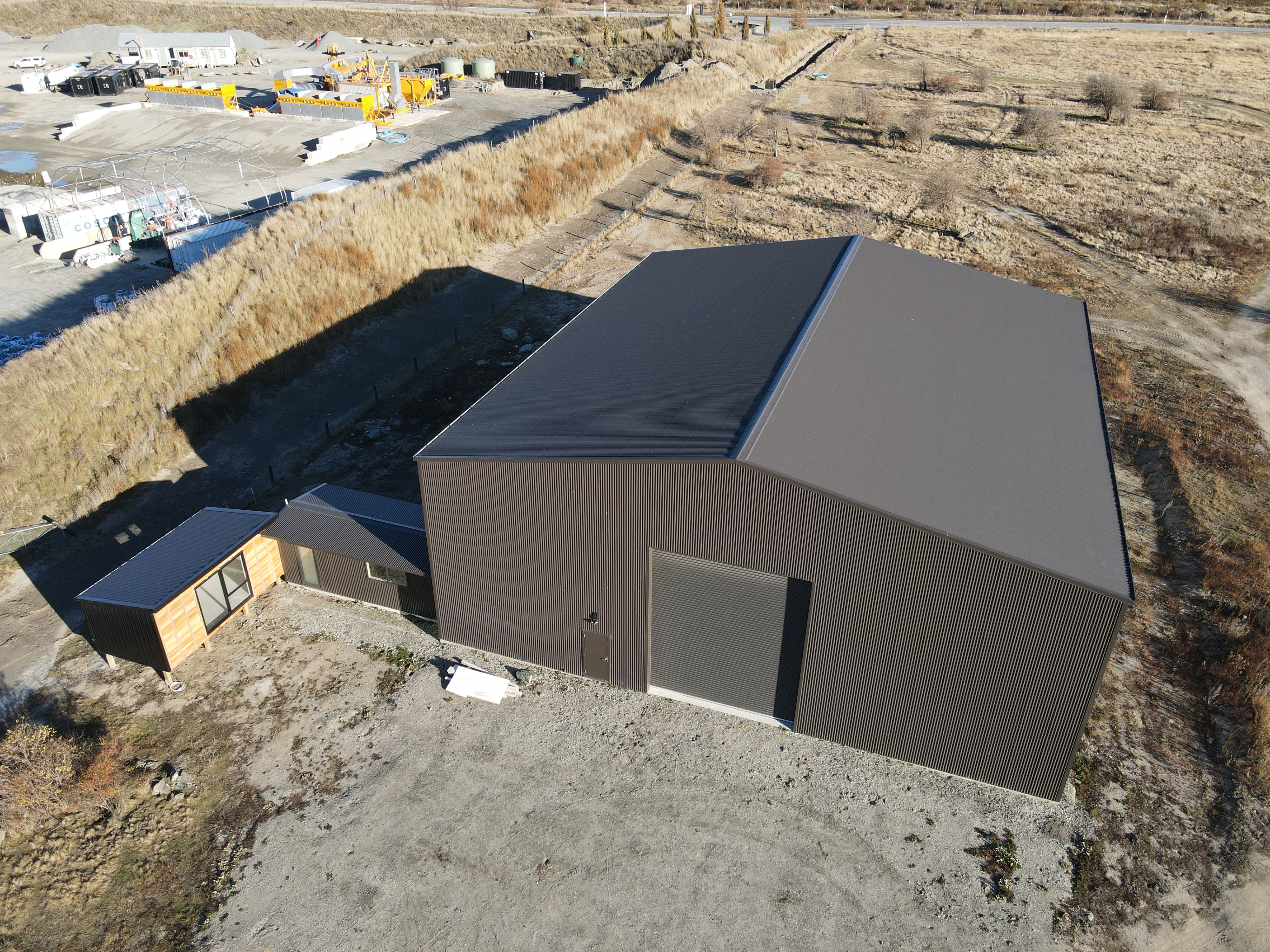 Paradise Studios wet-weather cover building at Victoria Flats — aerial view