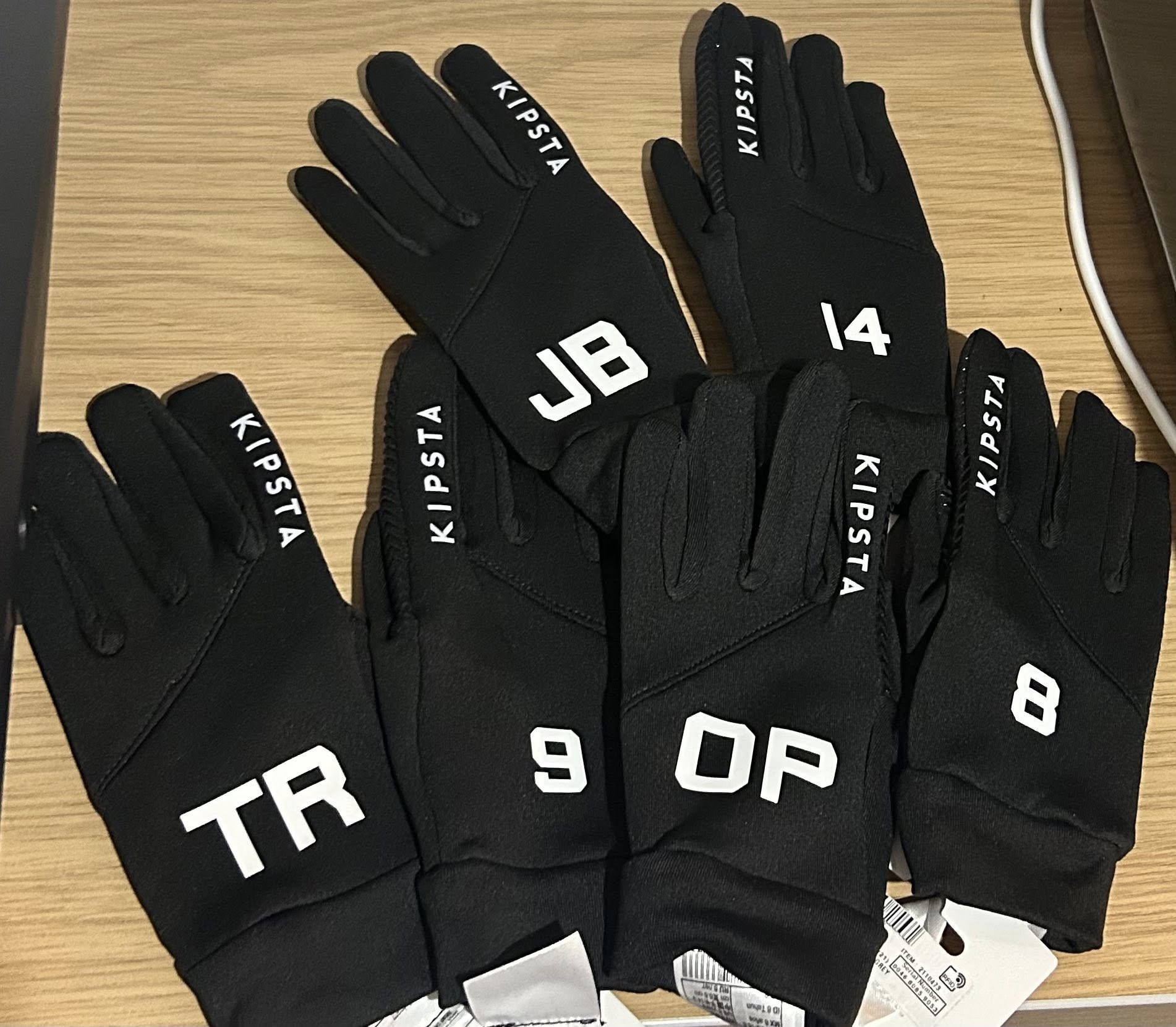 Personalised initials and numbers on team gloves