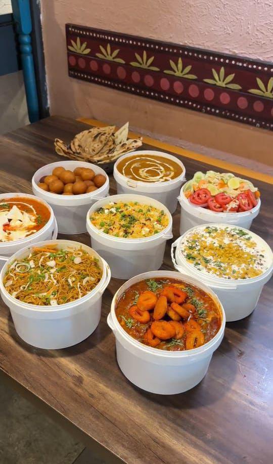 Delicious Food Spread - Dal, Paneer, Biryani, Raita