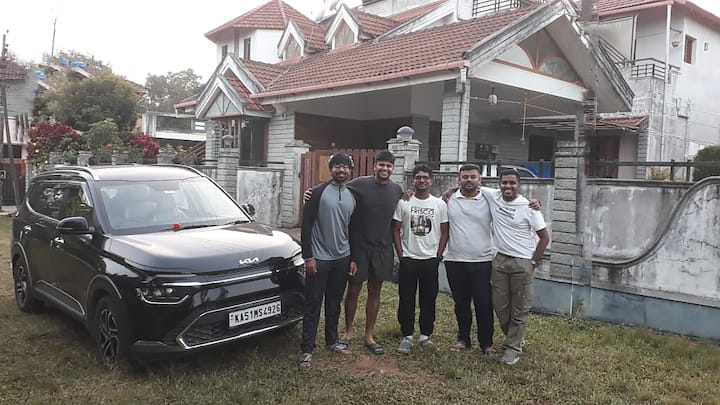 Happy Group with Vehicle