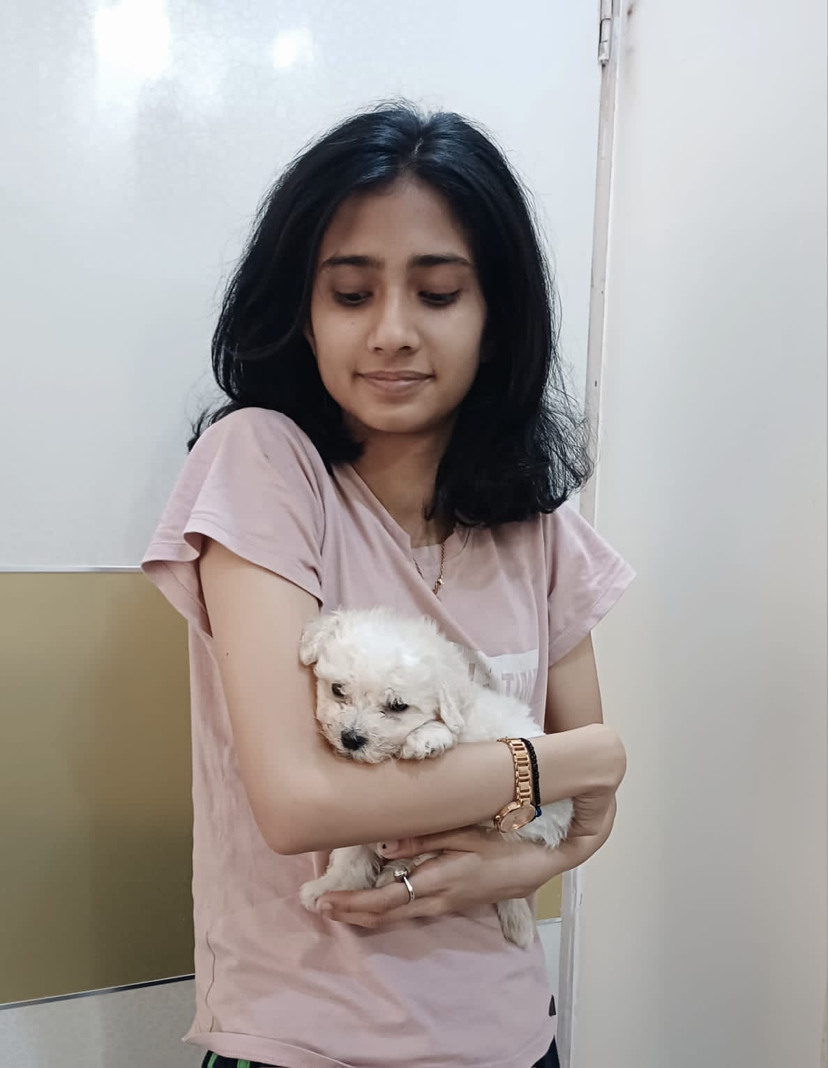 Happy customer with white puppy