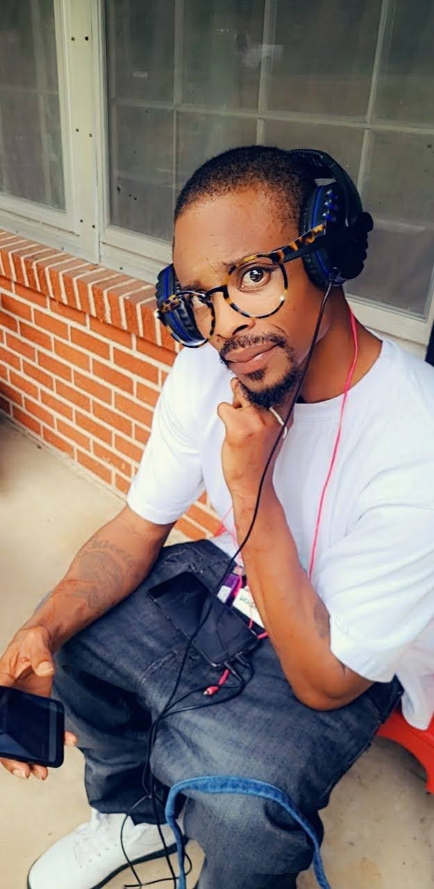 Corey Twitty — headphones on, building Custom Made Tunez