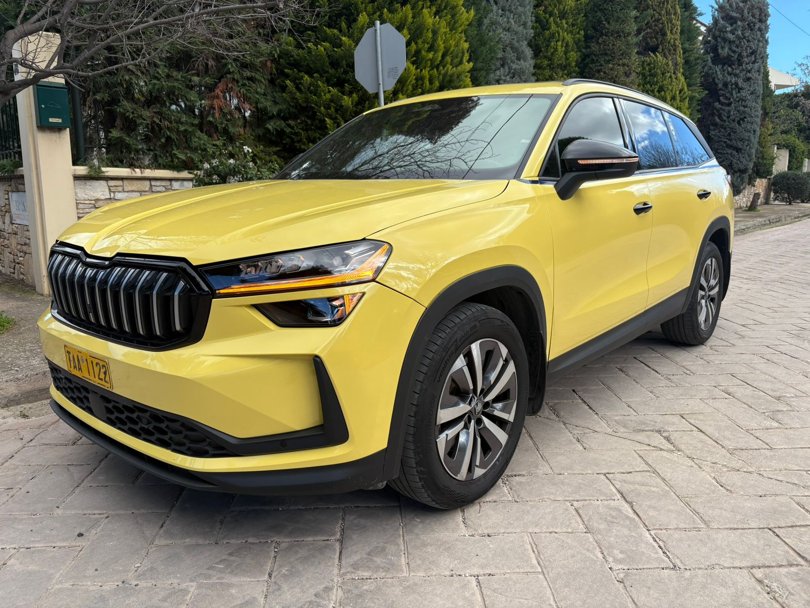 Our yellow Skoda Kodiaq SUV taxi from the fleet