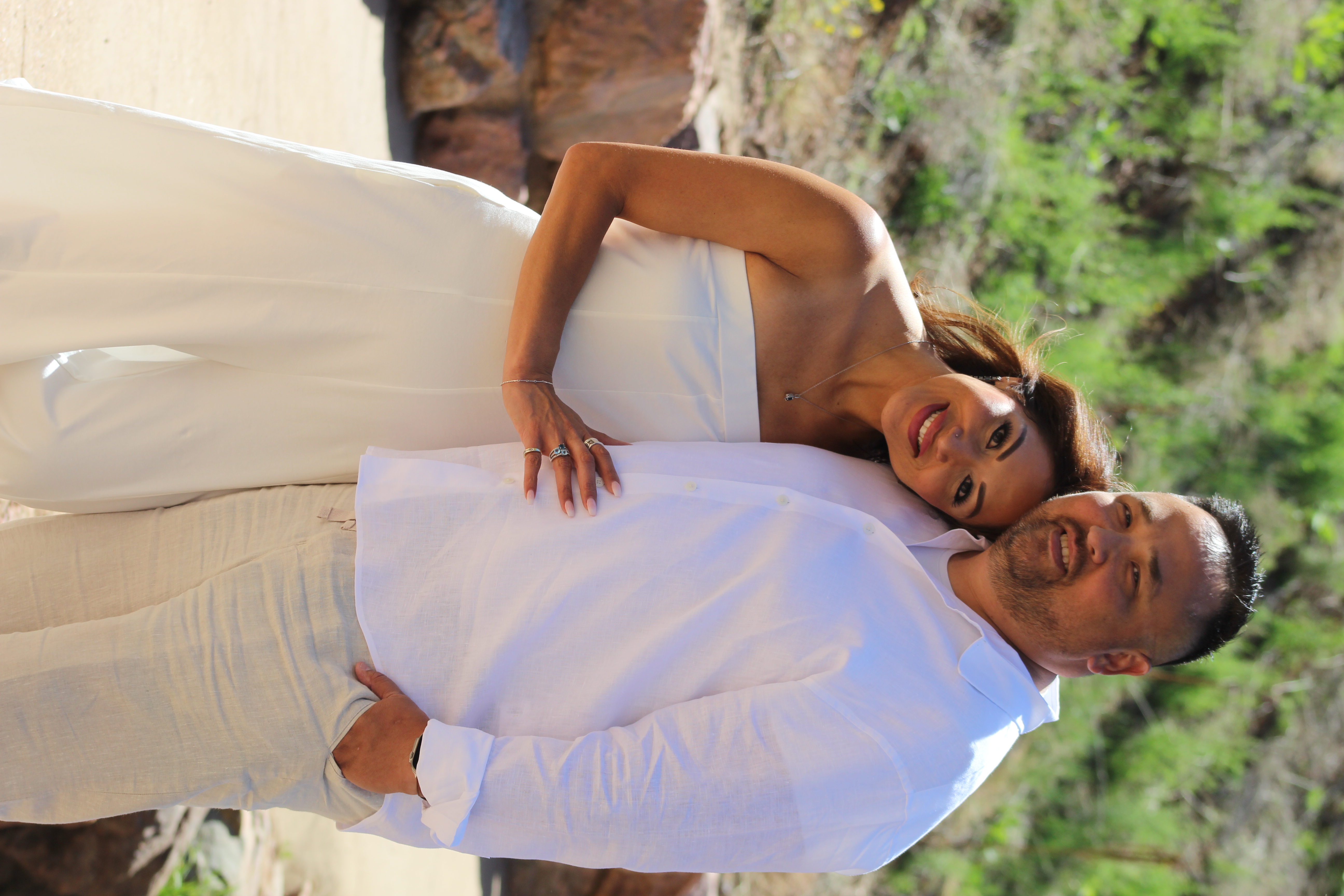 Couple in white at the rock garden