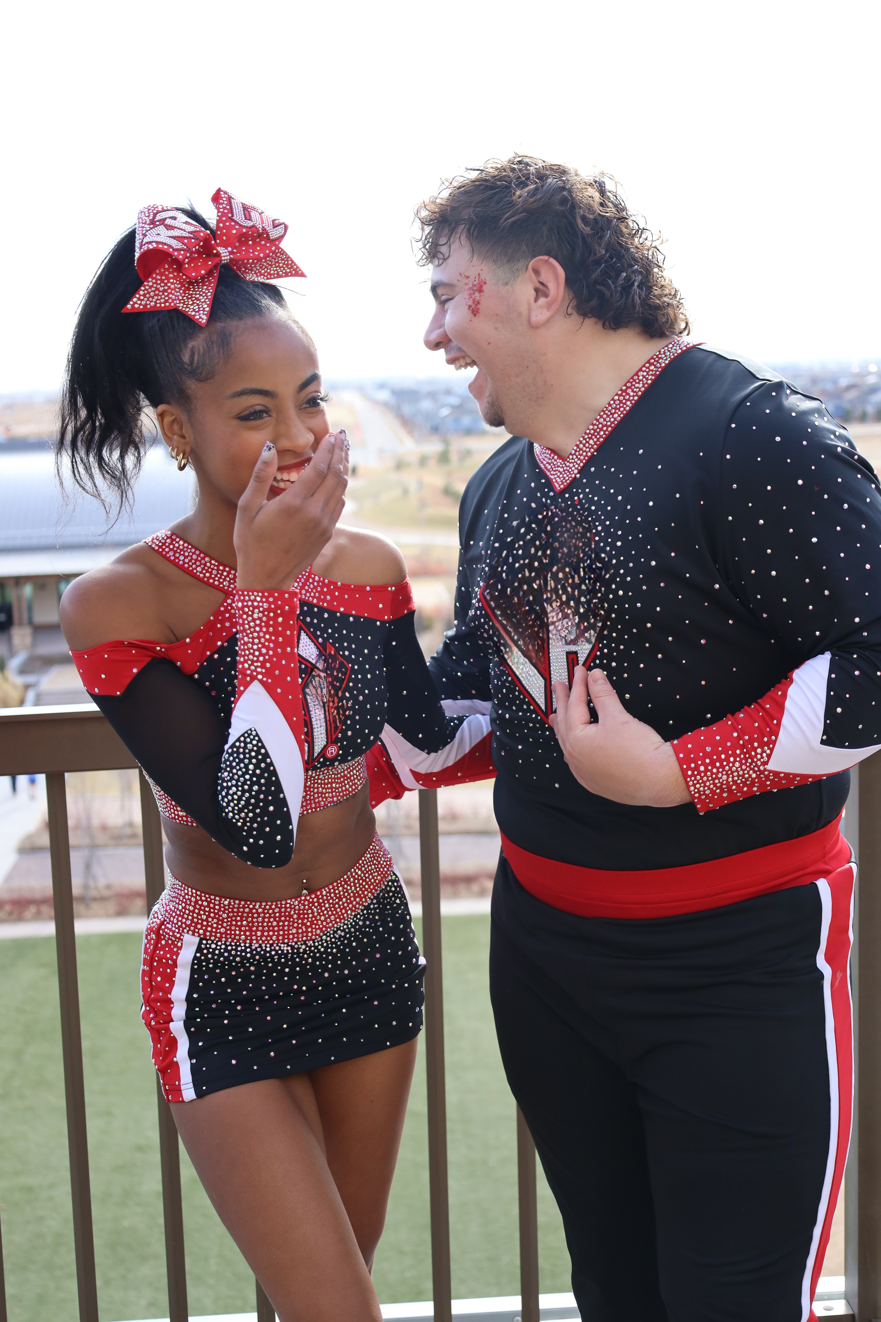 Cheer teammates laughing